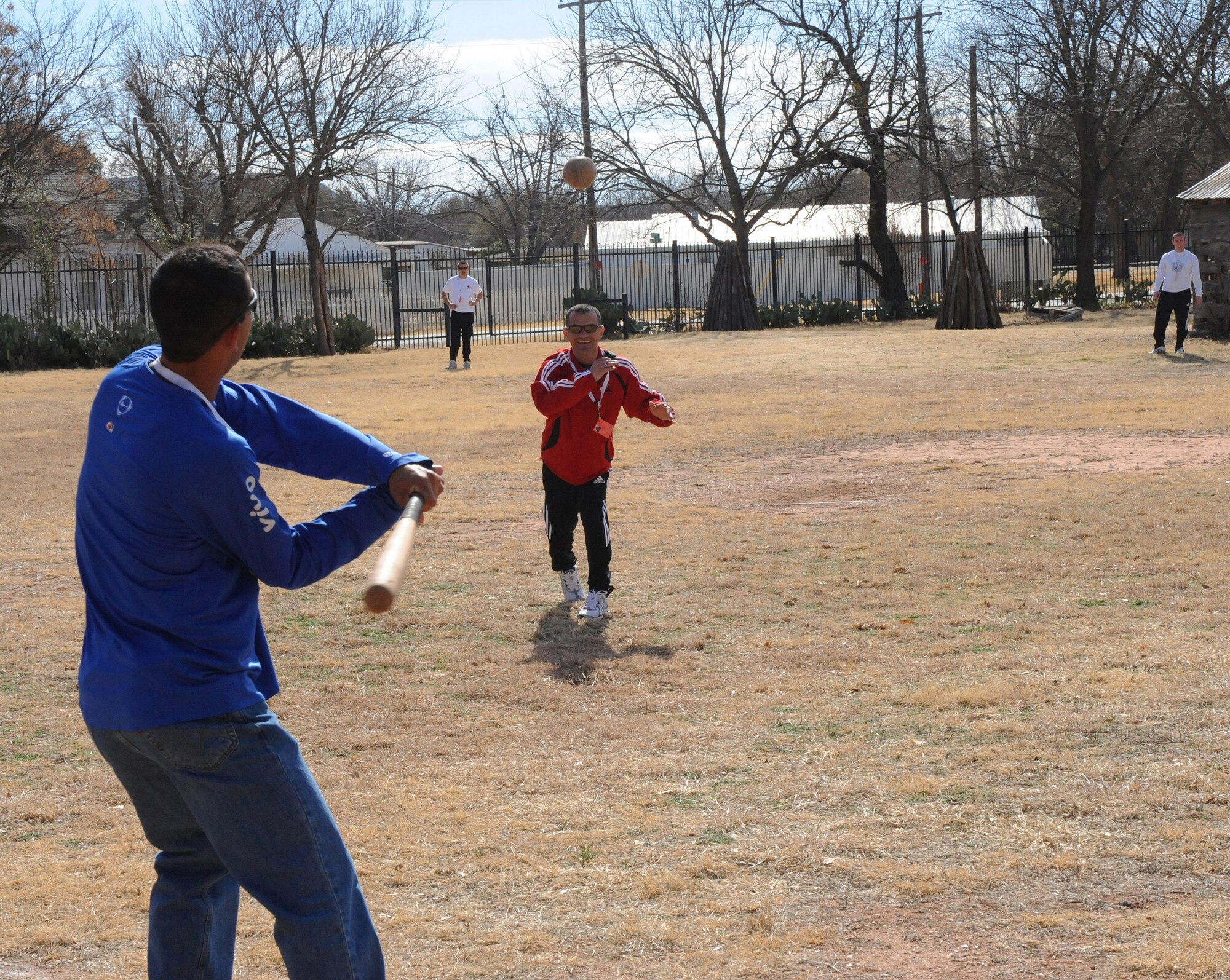 BUFFALO GAP, Texas -- Members from the Conseil International du Sport Militaire (CISM) competition play a game of baseball in the Vintage Base Ball field at Buffalo Gap?s Historic Village here, Feb 24.  The day was filled visiting the Buffalo Gap Historical Village, Perini Ranch Steakhouse, Frontier Texas, and a trip to the Abilene Mall.  The men?s military soccer championship was hosted by Dyess Air Force Base and promoted by the International Military Sports Council to form friendship through sports with different countries.  (U.S. Air Force photo by Staff Sergeant Connor Estes)