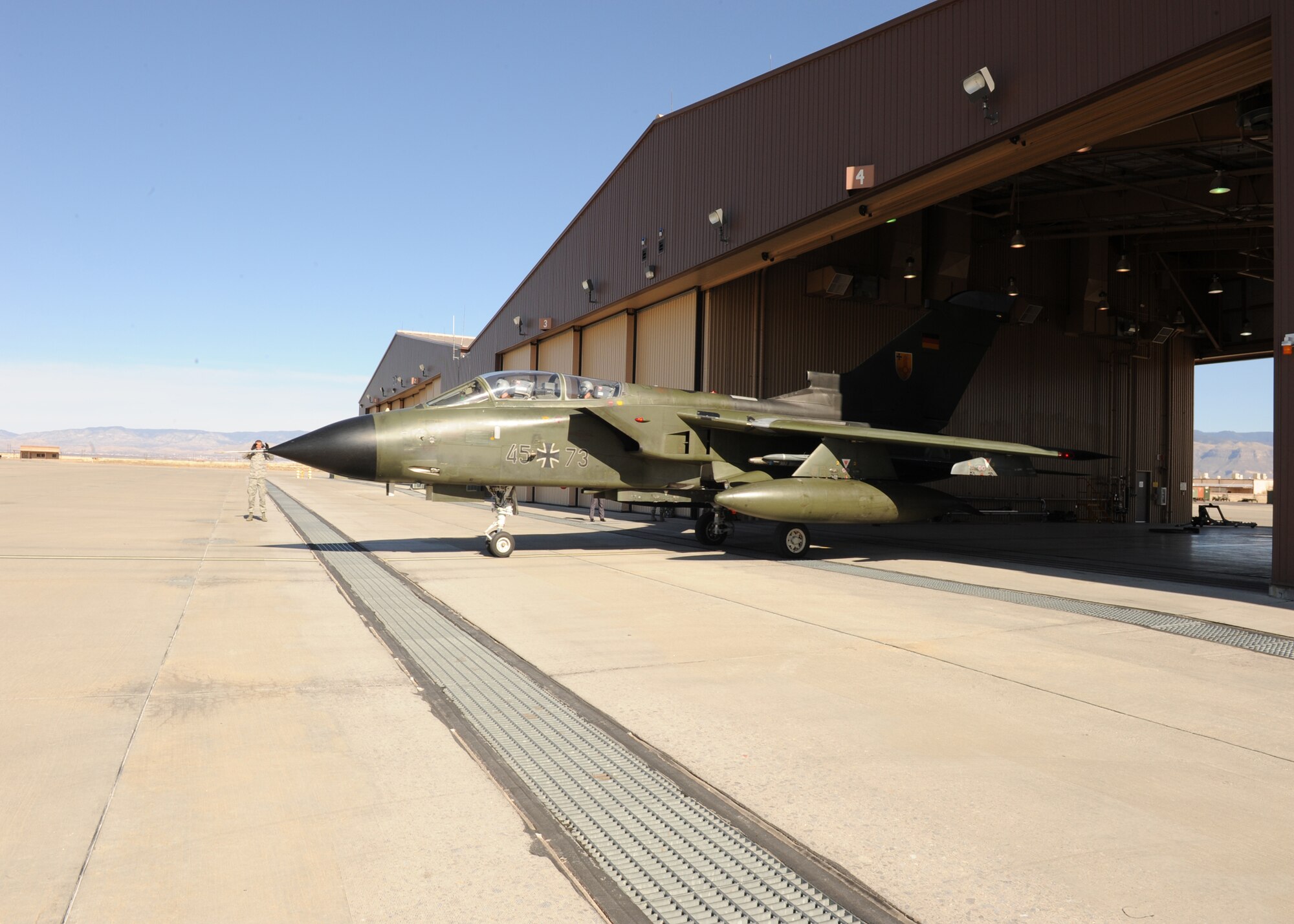 As a sign of the joint operations that take place between allied nations at Holloman Air Force Base, N.M., Col. Michael Stapleton, 49th Operations Group commander, prepares to take off on his first flight in the German Tornado, Feb. 20. The 49th Fighter Wing works closely with the German Air Force Flying Training Center which has over 600 German military personnel and over 20 Tornado aircraft assigned to Holloman. (U.S. Air Force photo/Airman 1st Class Rachel A. Kocin)