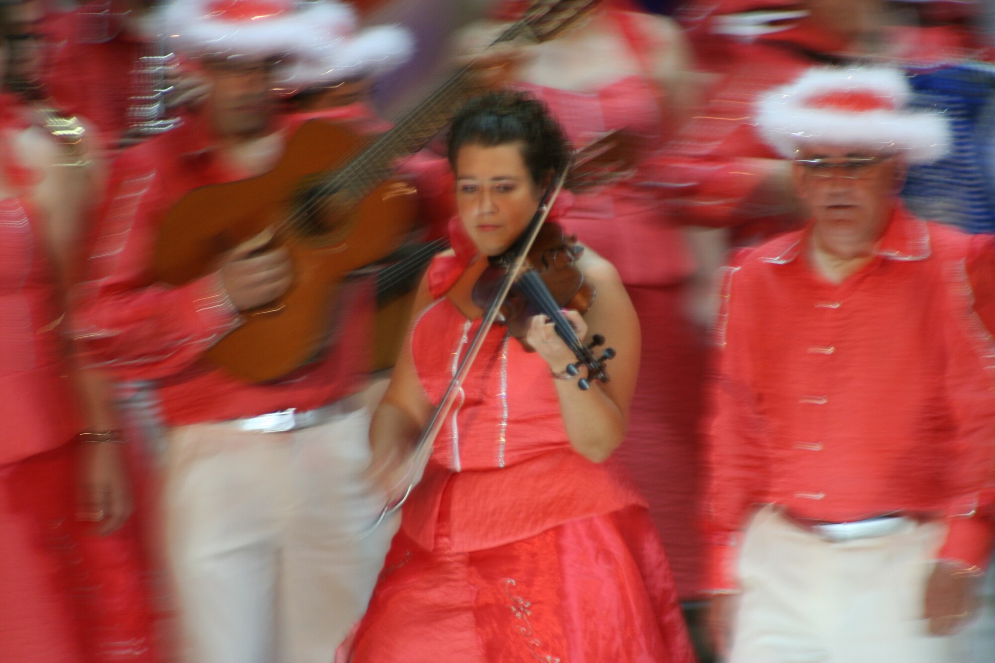 Elizabeth Scheperle, 65th Medical Group, performs in "Estado da Nação" or “The State of the Nation” during the last day of the “Carnaval” celebration Feb. 24 in the town of Fontinhas, Terceira, Azores, Portugal. (U.S. Air Force photo by 1st Lt. George Tobias)