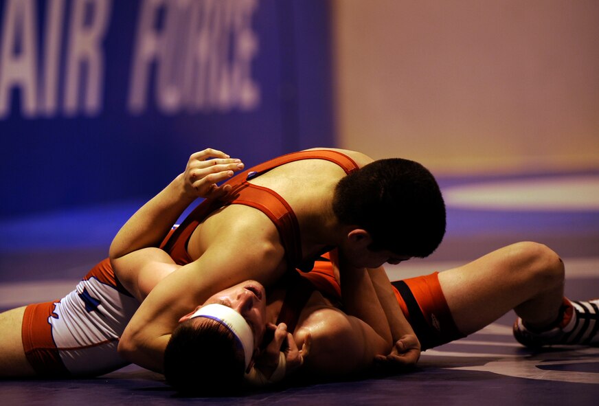 MOUNTAIN HOME AIR FORCE, Idaho - Airman Matthew Adams from Spangdahlem Air Base, Germany, wrestles Senior Airman Dean Maraj from Royal Air Force Croughton, United Kingdom, Feb. 25. Wrestlers from all around the Air Force are participating in the Air Force Wrestling Camp at Mountain Home Air Force Base, Idaho, and began arriving Feb. 13. The Airmen will continue to train until the "wrestle-off" March 7 and 8 when they try out for the Air Force team. (U.S. Air Force photo/ Senior Airman Stephany Miller)
