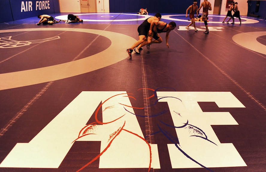 MOUNTAIN HOME AIR FORCE BASE, Idaho -- Airman 1st Class Nader Maghribi from Travis Air Force Base, Calif., wrestles against Jeff Zastrow from the Air Force Academy during the Air Force Wrestling Camp held at Mountain Home Air Force Base, Idaho, Feb. 25. The Airmen will continue to train until the "wrestle-off" March 7 and 8 when they try out for the Air Force team. (U.S. Air force photo/ Senior Airman Ryan Crane)