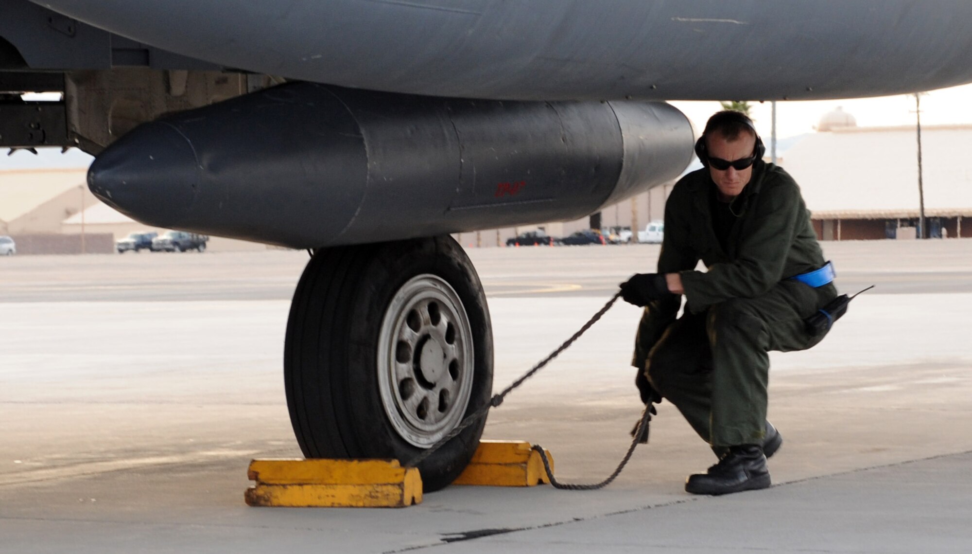 NELLIS AIR FORCE BASE, Nev. -- Tech. Sgt. Jason Leigh, 389th Aircraft Maintenance Unit aircraft recovery, recovers an F-15E Strike Eagle while participating in Red Flag 09-3 at Nellis Air Force, Base, Nev., Feb. 20. Red Flag, the Air Force’s largest air-to-air combat training exercise, includes more than 90 aircraft, 2,000 personnel and 27 units. This Red Flag is the first time since 1981 that the exercise will run for three straight weeks. (U.S. Air Force photo by Airman First Class Debbie Lockhart)
