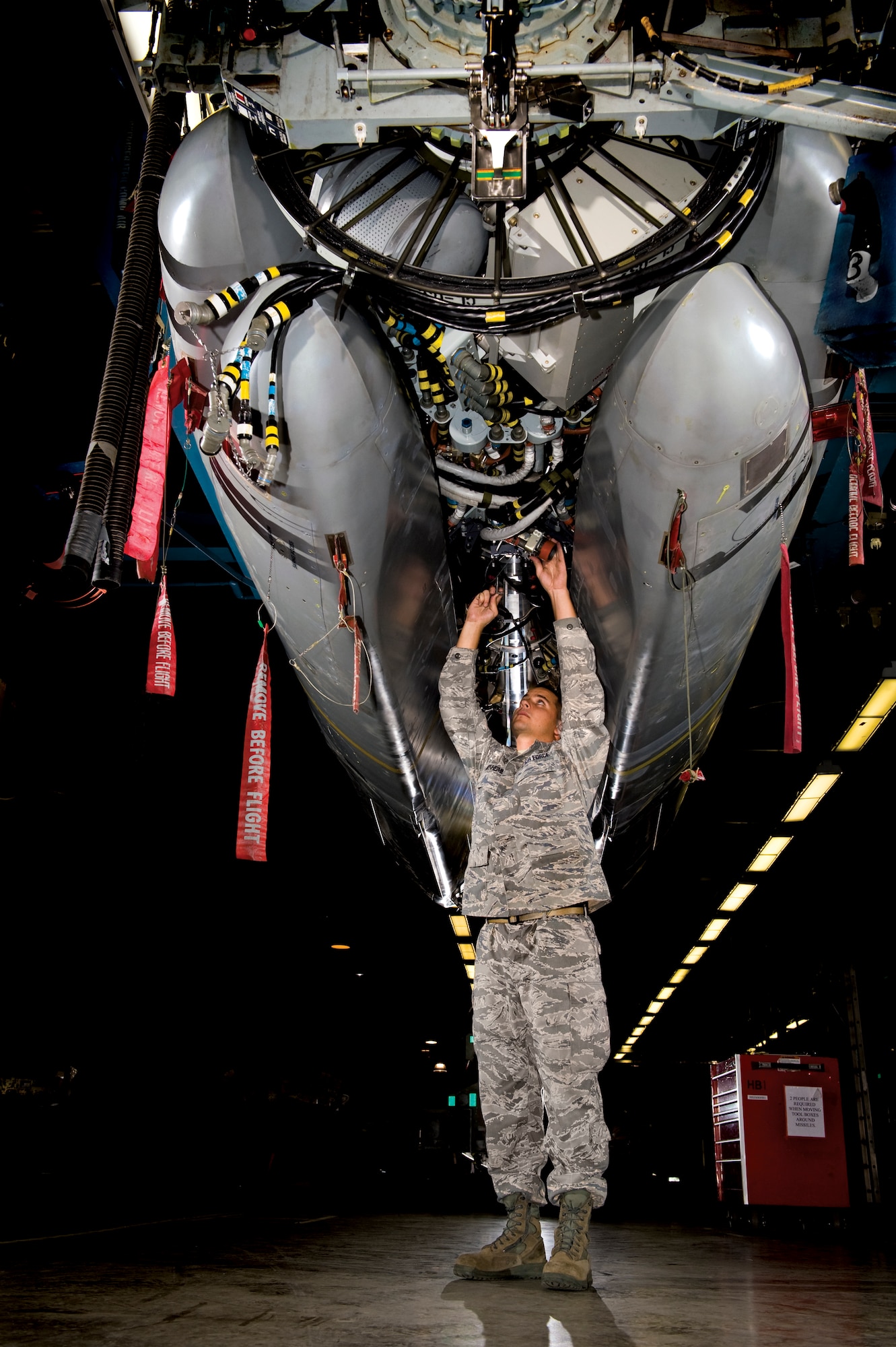 Staff Sgt. Chris Misenheimer performs routine maintenance on a rotary launcher at Barksdale Air Force Base, La. Sergeant Misenheimer is a nuclear weapons technician with the 2nd Munitions Squadron at Barksdale AFB. (U.S. Air Force photo/Lance Cheung)