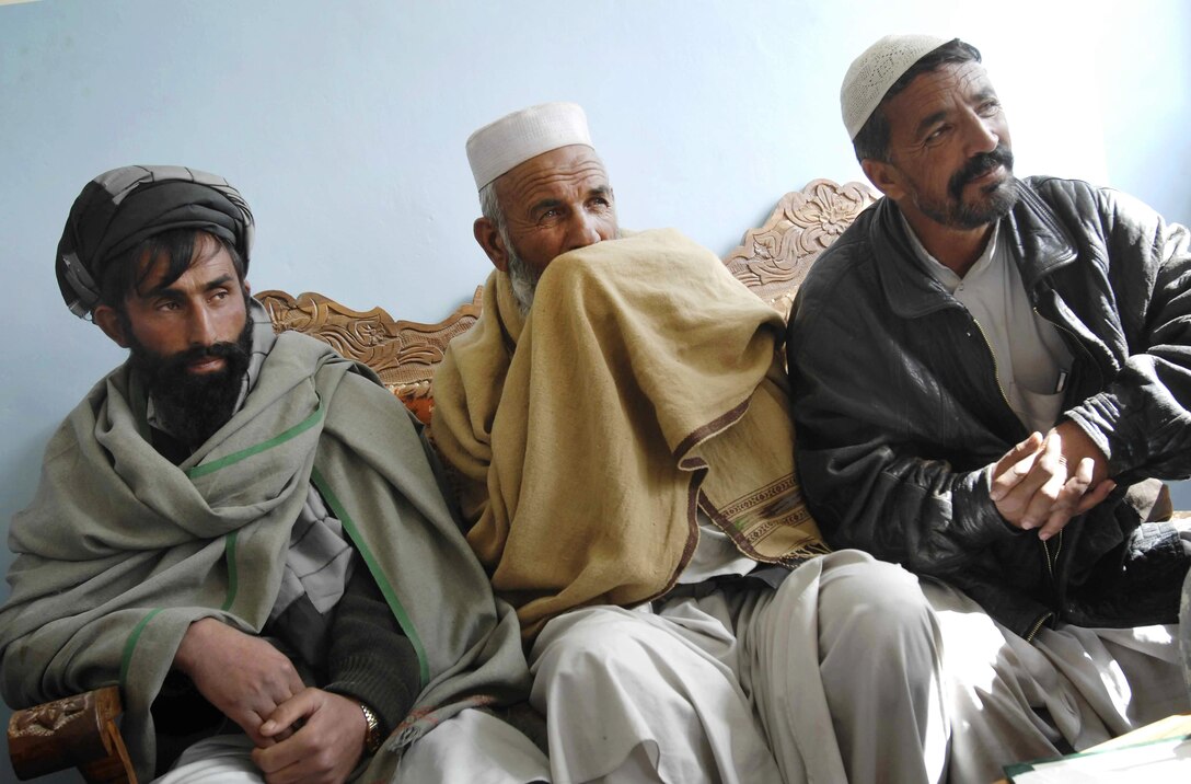 Afghan tribal elders listen during a meeting with Paktia Provincial Reconstruction Team civil affairs leaders in Gardez City, Afghanistan, Feb. 24, 2009. The team meets with provincial and local leaders to identify potential development projects in the districts.
