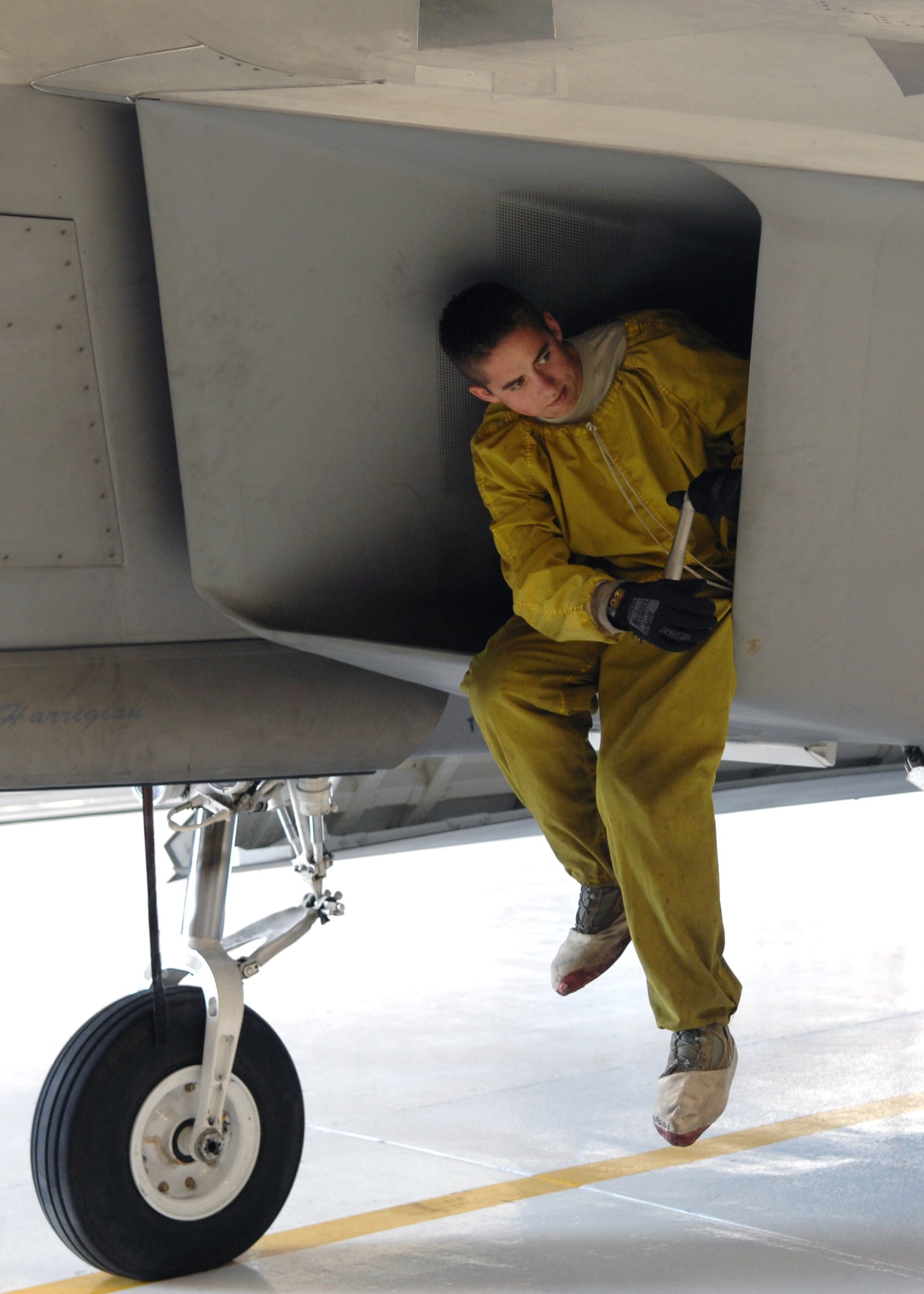Senior Airman Bryan McMahon, 49th Aircraft Maintenance Squadron, prepares for an intake inspection on an F-22A Raptor at Holloman Air Force Base, N.M., Feb. 23. Airman McMahon checks the intake for any foreign object damage and motor malfunction as part of pre-flight generation. (U.S. Air Force photo/Airman 1st Class Veronica Salgado)