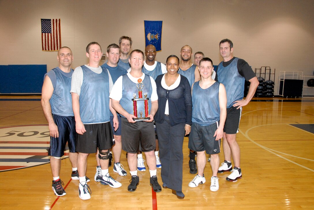 The 2009 Whiteman Air Force Base Over-30 Extramural Basketball champion team from the 442nd Fighter Wing, an Air Force Reserve Command A-10 unit based at Whiteman.  This was the fifth time in seven years the 442nd has taken the title.  (U.S. Air Force photo/Maj. David Kurle)