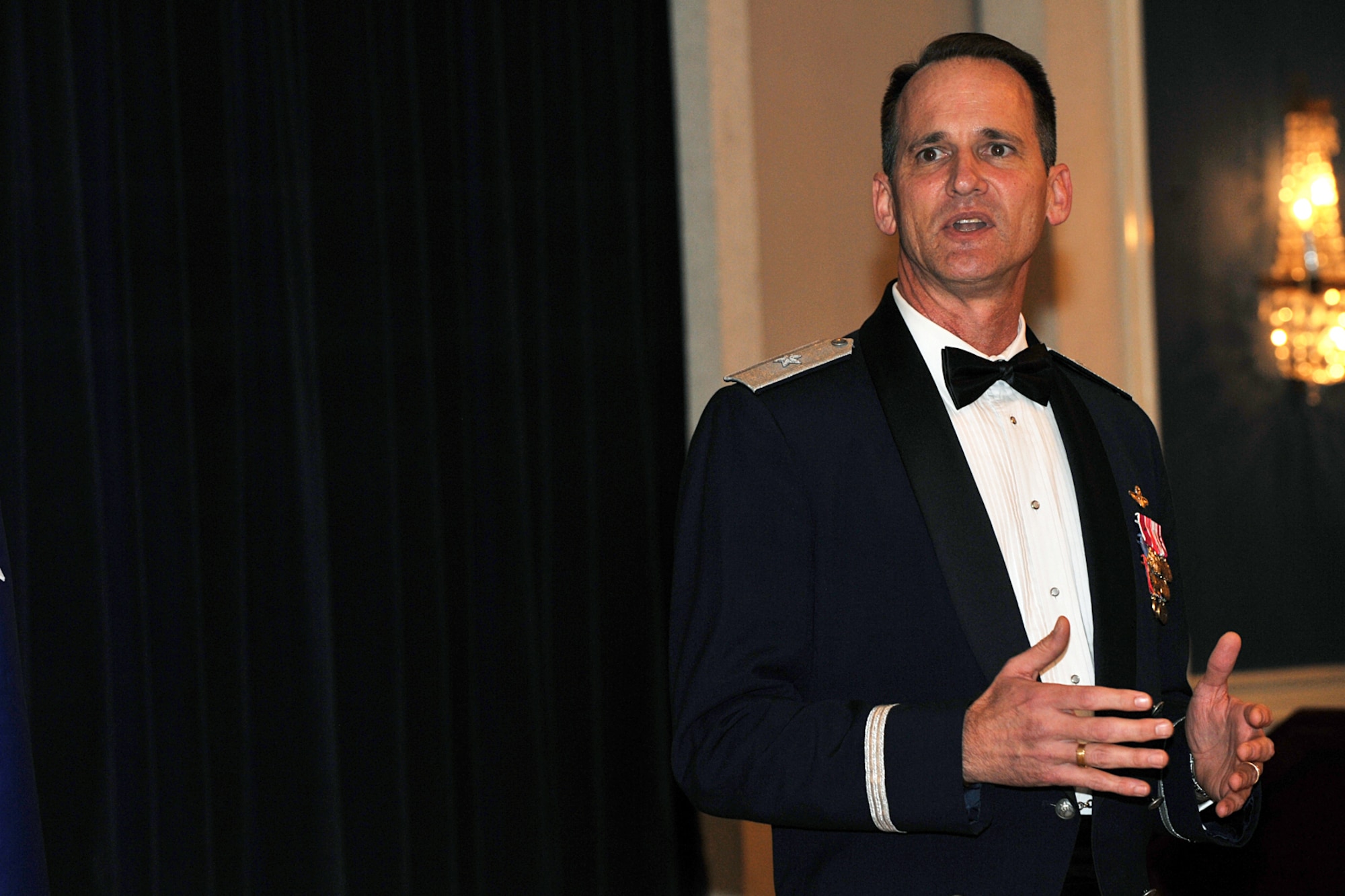OFFUTT AIR FORCE BASE, Neb.-- Brig. Gen. James Jones, 55th Wing commander, encourages class 09- C graduates from the James M. McCoy Airman Leadership School here Feb.12. Through four weeks of dedication and hard work, 37 graduates enhanced their leadership skills to guide the next generation of Airmen coming into the Air Force. 