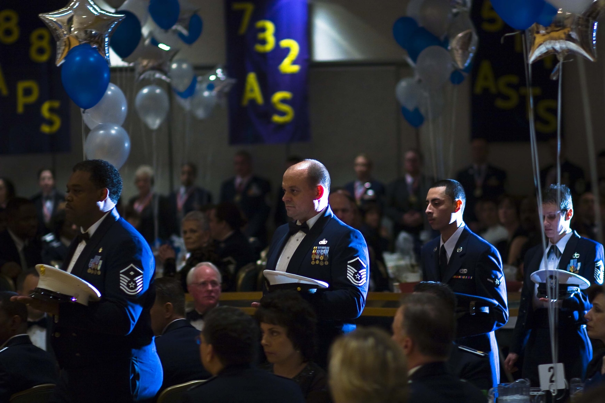 MCGUIRE AIR FORCE BASE, N.J. -- More than 60 Citizen-Airmen and civilians were honored for their achievements at the 514th Air Mobility Wing Annual Awards Banquet held Jan. 24 at The Club. The night's festivities began with paying tribute to the men and women from all military branches who gave their lives in service to their country. (U.S. Air Force photo/Staff Sgt. Carlos Aponte)