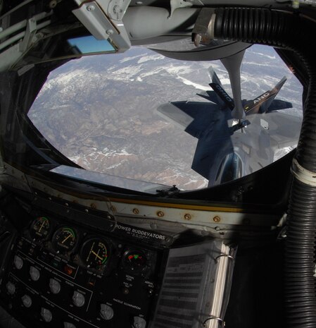 An F-22A Raptor is refueled by a KC-135 Stratotanker from Rickenbacker Air National Guard Base Columbus, Ohio, as part of a Joint RED FLAG exercise at Nellis AFB, Nev., Feb. 24.  RED FLAG is a multi-national exercise providing a realistic environment to practice combat scenarios. The experience gained during the exercises is valuable to the survival and success of air crews in combat.  (U.S Air Force photo by Staff Sgt. Taylor Worley)