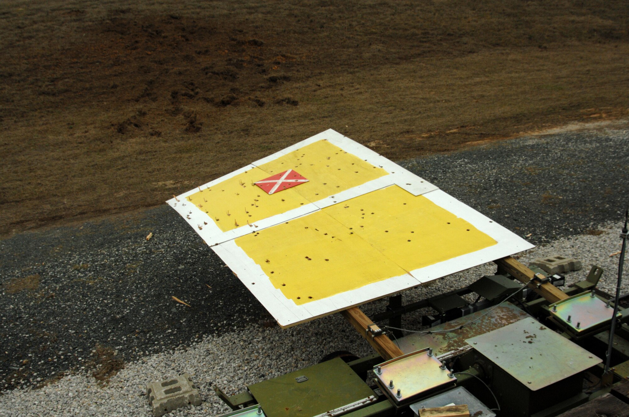 A roughly 10-by-5-foot moving target apparatus reveals the damage done by A-10s' 30mm GAU-8 cannon fire during training at Green Flag East, an air-to-ground combat exercise in Louisiana. Davis-Monthan's 354th Fighter Squadron participated in GFE for two weeks in order to practice close-air support with ground forces. (U.S. Air Force photo/Staff Sgt. Jake Richmond)