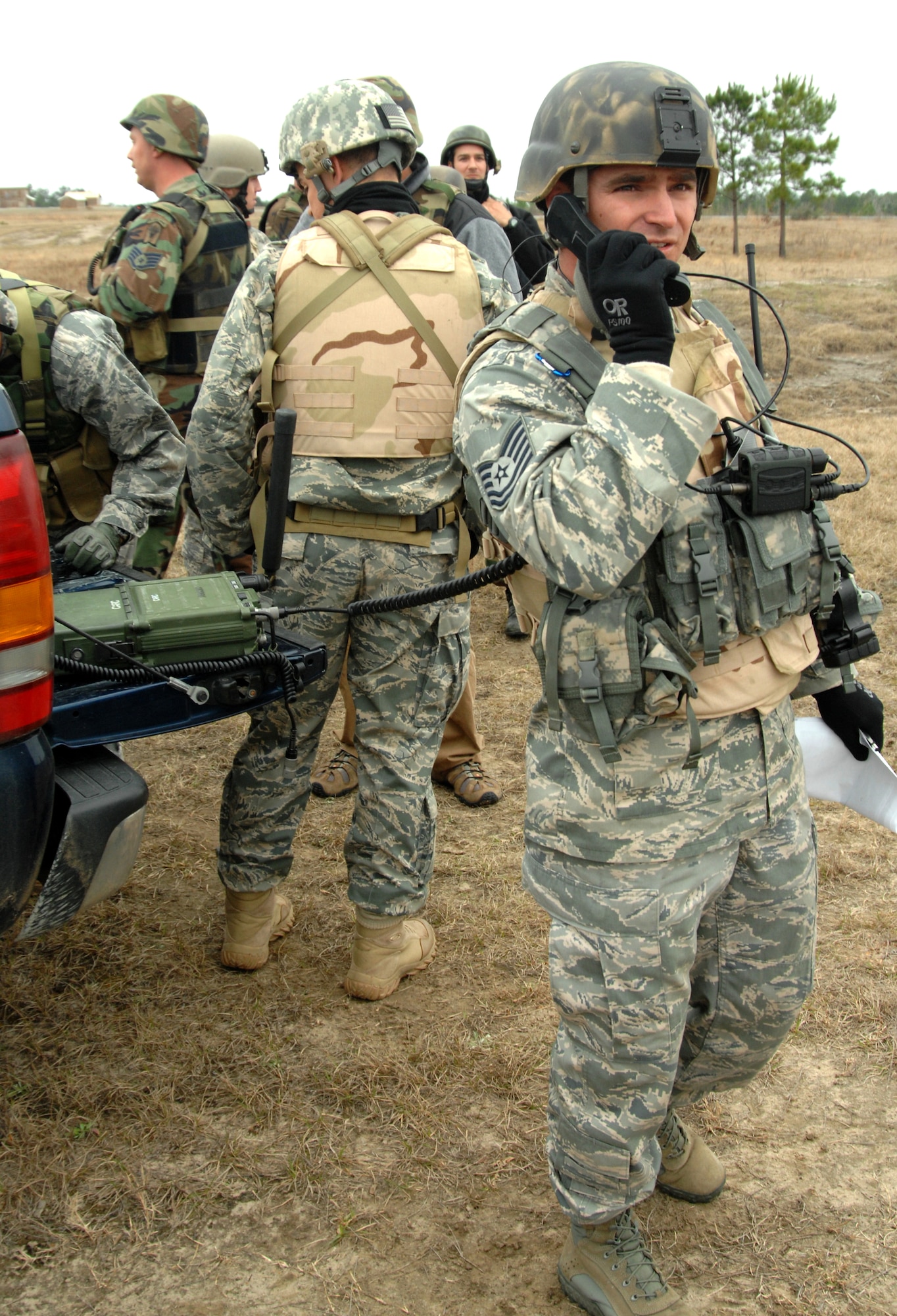 A Joint Terminal Attack Controller coordinates a close-air support attack with a pilot nearing his location during moving-target strafe training at Green Flag East, a close-air support exercise in Louisiana. (U.S. Air Force photo/Staff Sgt. Jake Richmond)