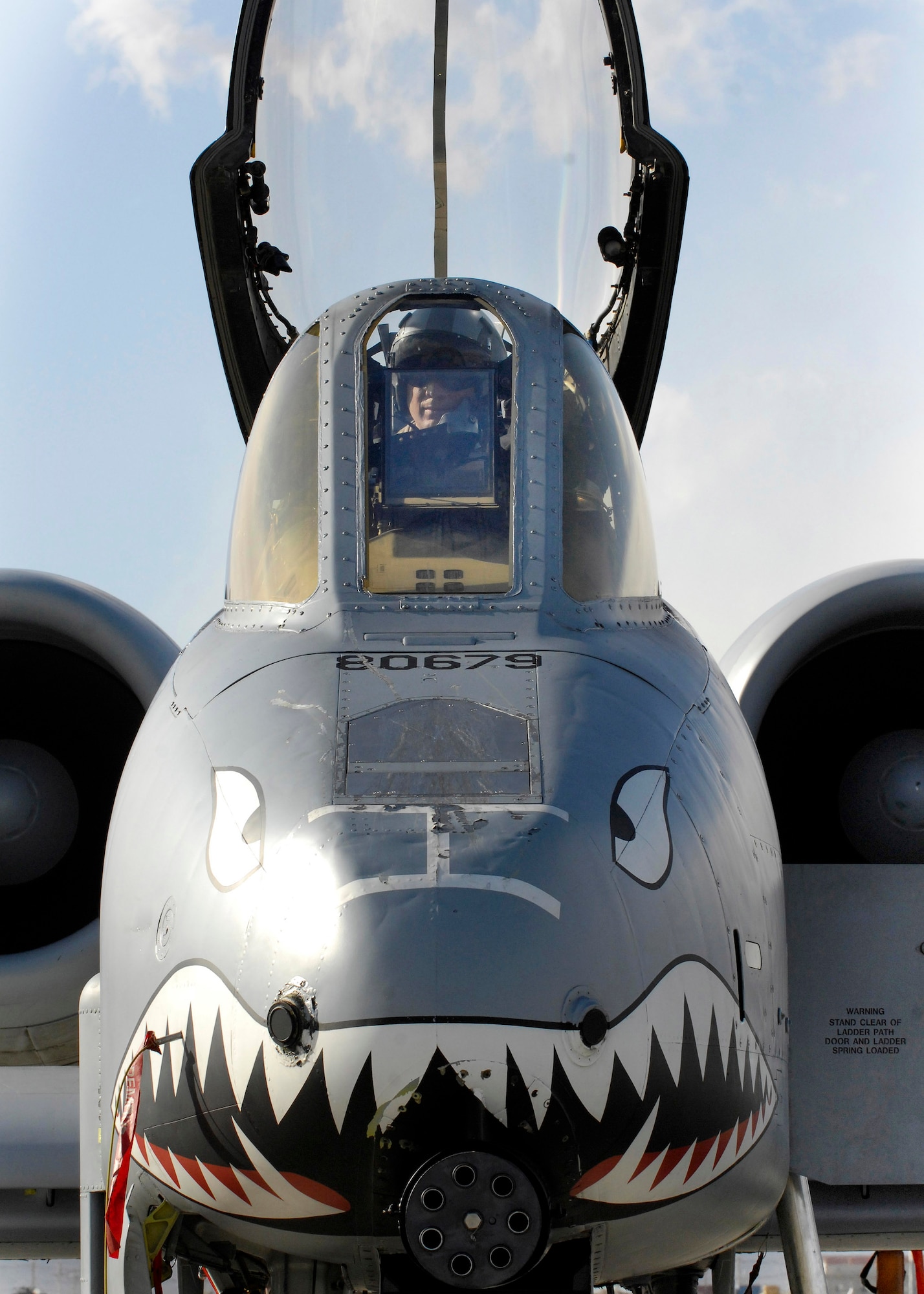 Lt. Col. Sam Milam prepares to disembark from an A-10 Thunderbolt II after competing a mission that broke the unit's 10,000th combat flight hour mark during a single deployment rotation Feb. 24 at Bagram Airfield, Afghanistan. Members of the 75th EFS arrived here in September for a four-month deployment, but was extended to six months. Colonel Milam is the 75th Expeditionary Fighter Squadron commander. (U.S. Air Force photo/Staff Sgt. Jason Lake) 
