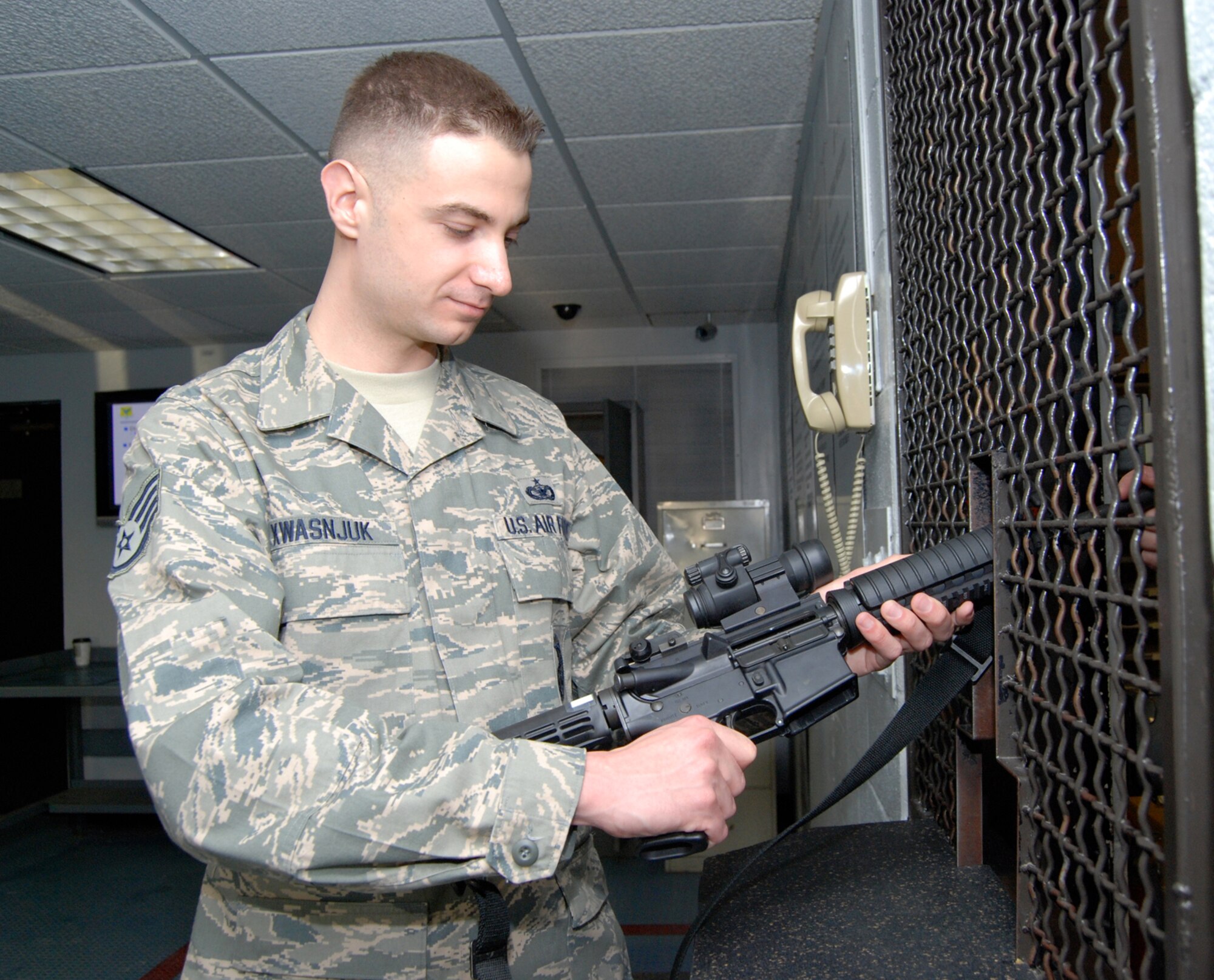 DOVER AIR FORCE BASE, Del. -- Staff Sgt. Peter Kwasnjuk, 512th Security Forces Squadron response force leader, was selected as the 512th Airlift Wing's Noncommissioned Officer of the Year for 2008. Sergeant Kwasnjuk helped aprehend suspects involved in shoplifting on base. He is currently pursuing two bachelor degrees in accounting and finance. (U.S. Air Force photo/Staff Sgt. Steve Lewis)