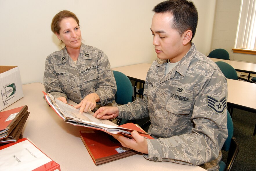 DOVER AIR FORCE BASE, Del. -- Capt. Shirley Whitney (left), 709th Airlift Squadron executive officer, was selected as the 512th Airlift Wing's Company Grade Officer of the Year for 2008. Capt. Whitney had a 100 percent mission success rate on a deployment to Iraq in 2008. She is also a senior probation and parole officer for Kent County, Del. (U.S. Air Force photo/Staff Sgt. Steve Lewis)