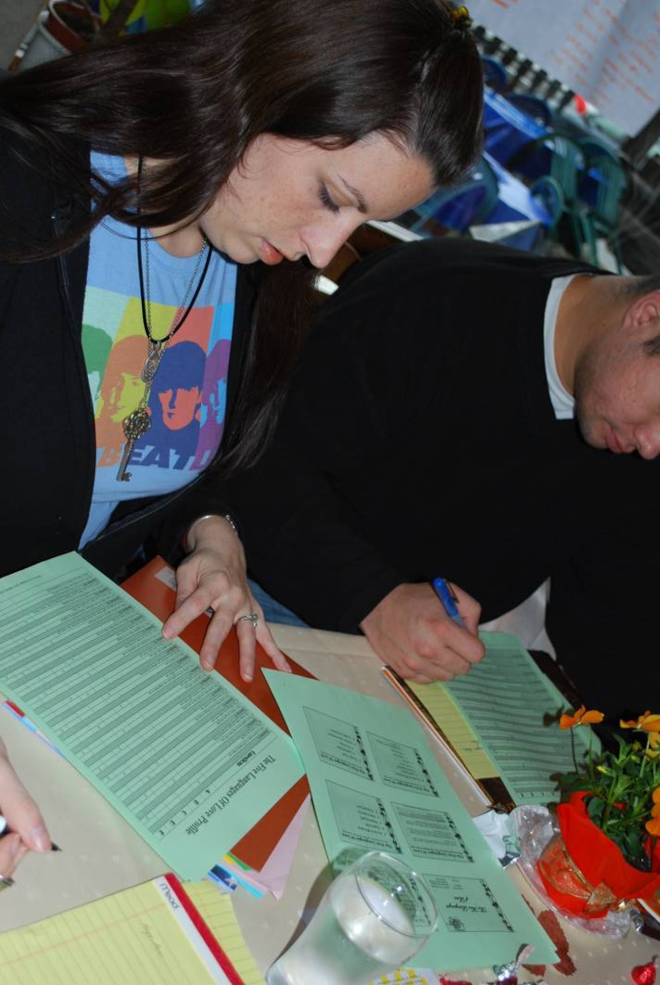 MARING, Germany -- Leah and Staff Sgt. John Martin, 52nd Aircraft Maintenance Squadron, fill out a Five Languages of Love profile during the fall 2008 Mosel Reintegration Retreat. The Airman & Family Readiness Center is offering another reintegration retreat March 27-29 to help couples learn skills to enhance their relationships after a period apart or to help them prepare for a pending deployment or remote assignment. (Courtesy photo)