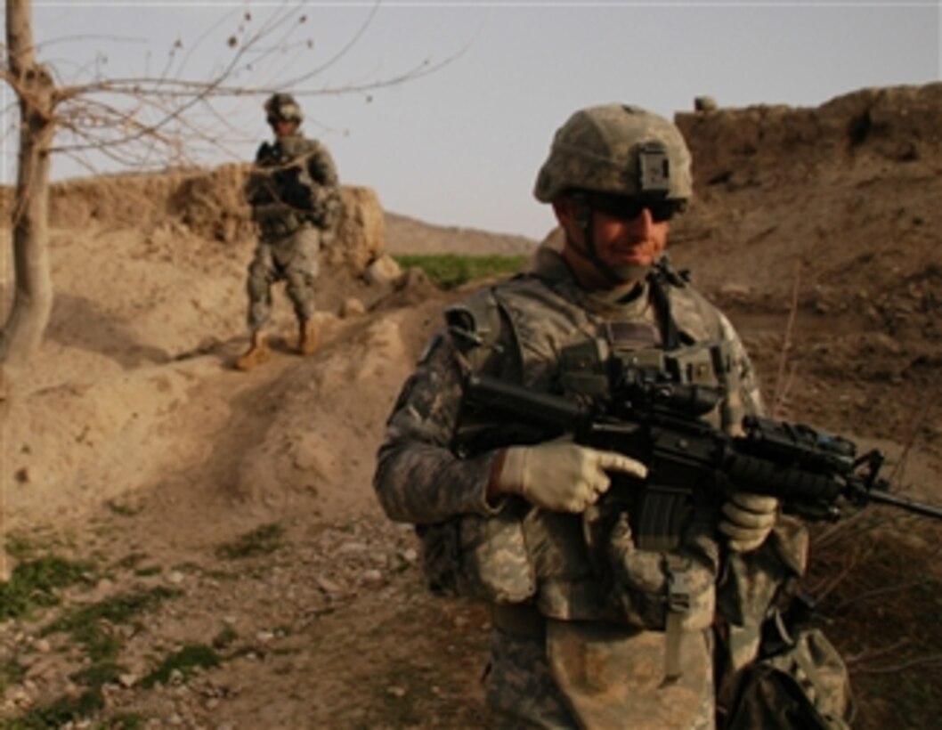 U.S. Army Sgt. Loren Allsup from 1st Battalion, 4th Infantry Regiment, United States Army Europe leads his squad during a foot patrol near Forward Operating Base Mizan, Afghanistan, on Feb. 23, 2009.  