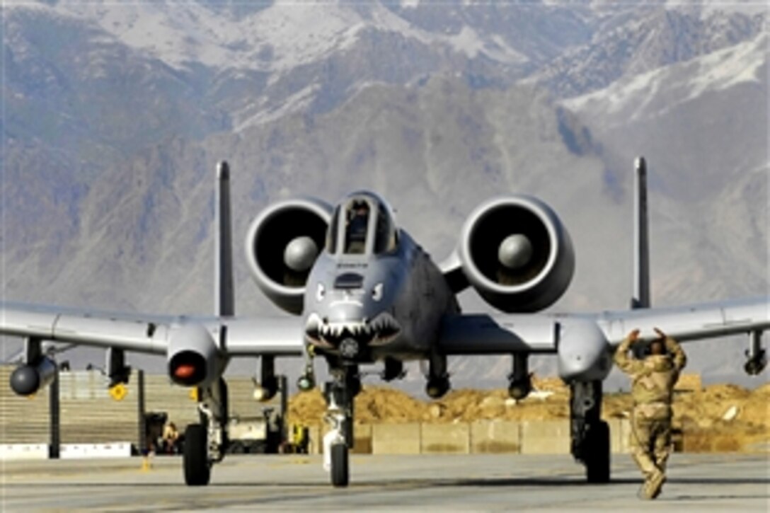 U.S. Air Force Lt. Col. Sam Milam taxies down the flightline in an A-10 Thunderbolt II after logging the unit's 10,000th combat flight hour during a mission on Bagram Airfield, Afghanistan, Feb. 24, 2009. Milam is the 75th Expeditionary Fighter Squadron commander.