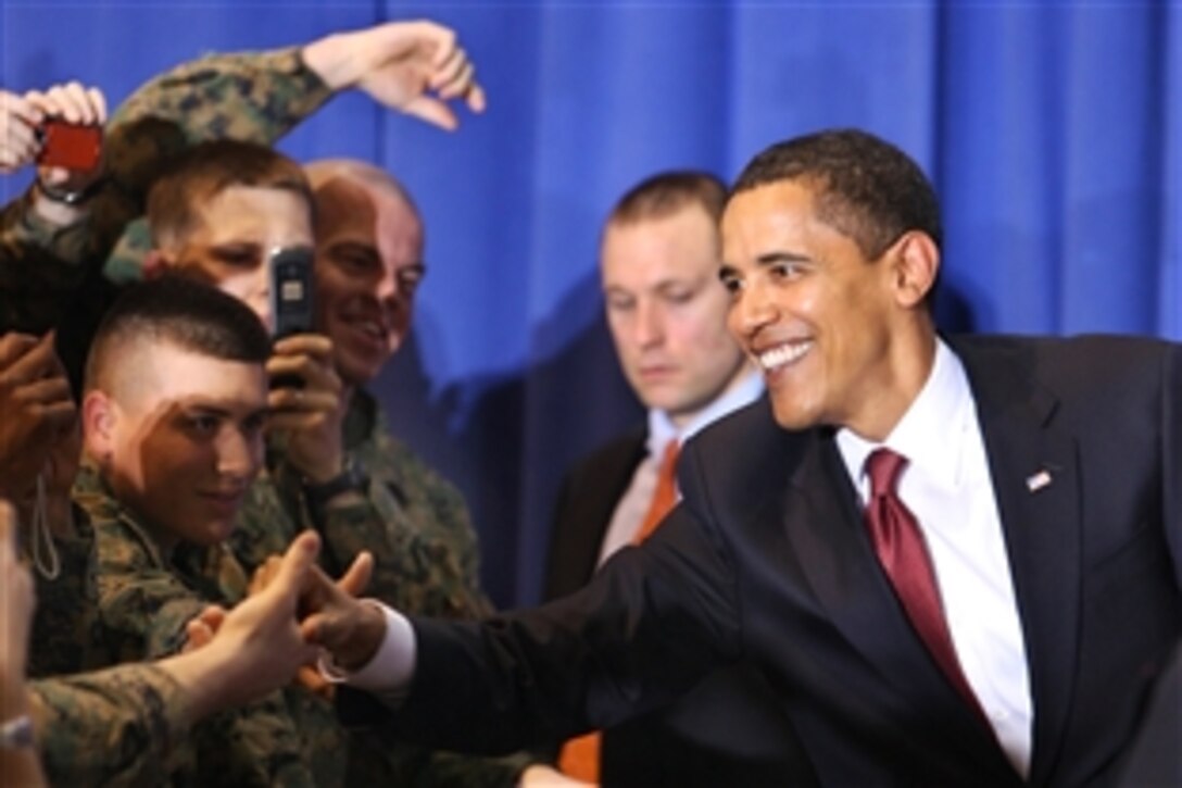 President Barack Obama shakes hands with troops and civilians during his visit to Camp Lejeune, N.C., Feb. 27, 2009. Obama was on the Marine Corps installation to discuss current policies and an exit strategy from Iraq.