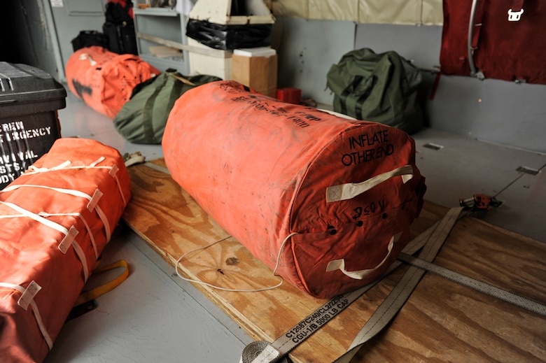 An emergency inflatable device sits near the cargo door of a KC-135 Stratotanker at McConnell Air Force Base, Kan., Friday. The KC-135 was bound for an aeromedical evacuation training mission that involved flying through the Bermuda Triangle. (U.S. Air Force photo/Tech. Sgt. Jason Schaap)