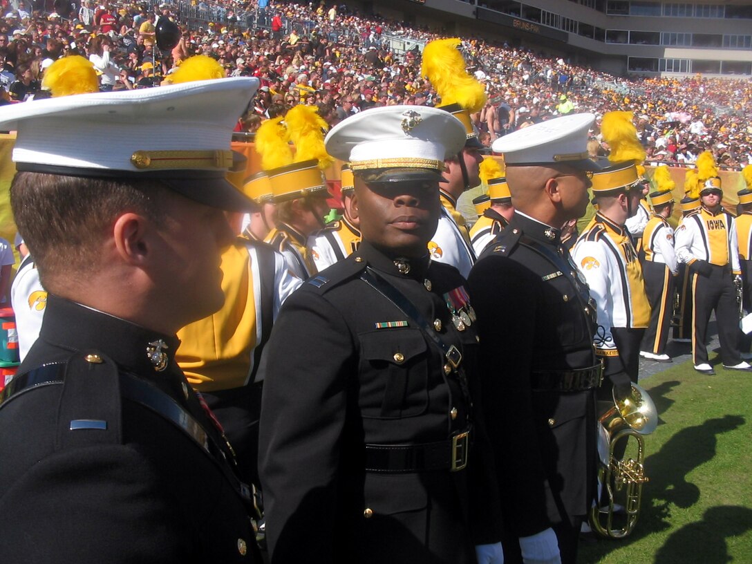 2nd Lt. Raymond Galbreth, Camp Lejeune, N.C., Capt. Tito Jone, Officer Selection Station Baton Rouge, La., and Capt. Thomas Eybl, Recruiting Station Columbia, S.C. prepare to take the field at halftime of the Outback Bowl Jan. 1 at Raymond James Stadium in Tampa, Fl. Galbreath represented University of Iowa alumni, while Jones and Eybl represented the University of South Carolina during the halftime festivities.