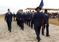 The first flight formation of Airmen preparing to graduate from basic military training march over the Enlisted Heroes Walk during the Jan. 2 ceremony at Lackland Air Force Base, Texas. (U.S. Air Force Photo/Alan Boedeker)