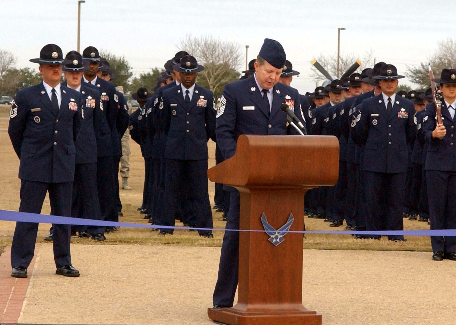 Chief Master Sergeant of the Air Force Rodney McKinley, addresses the audience, including more than 700 Airmen preparing to graduate from basic military training during the Jan. 2 dedication ceremony of the new Enlisted Heroes Walk at Lackland Air Force Base, Texas. (U.S. Air Force Photo/Alan Boedeker)