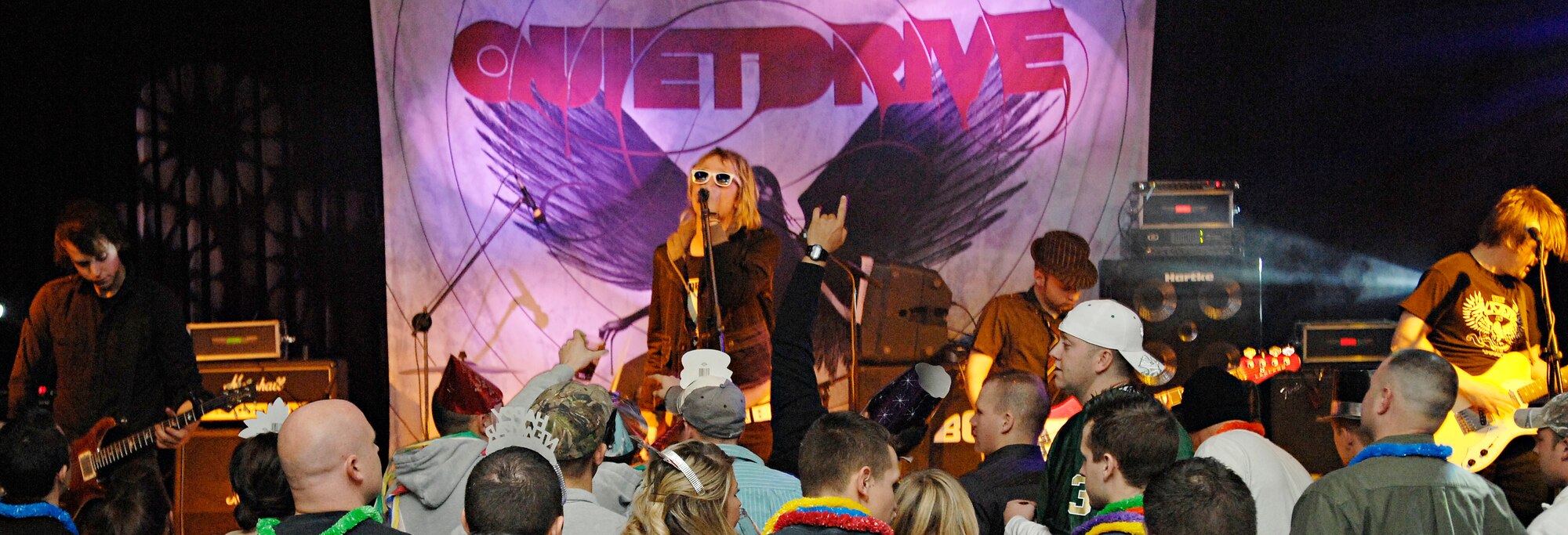 The Minneapolis-based rock band Quietdrive plays for a crowd of Airmen during the 2009 New Year’s Eve Bash hosted by the Incirlik Consolidated Club, Dec. 31. Quietdrive visited Incirlik as part of their Armed Forces Tour. (U.S. Air Force photo/Senior Airman Benjamin Wilson)