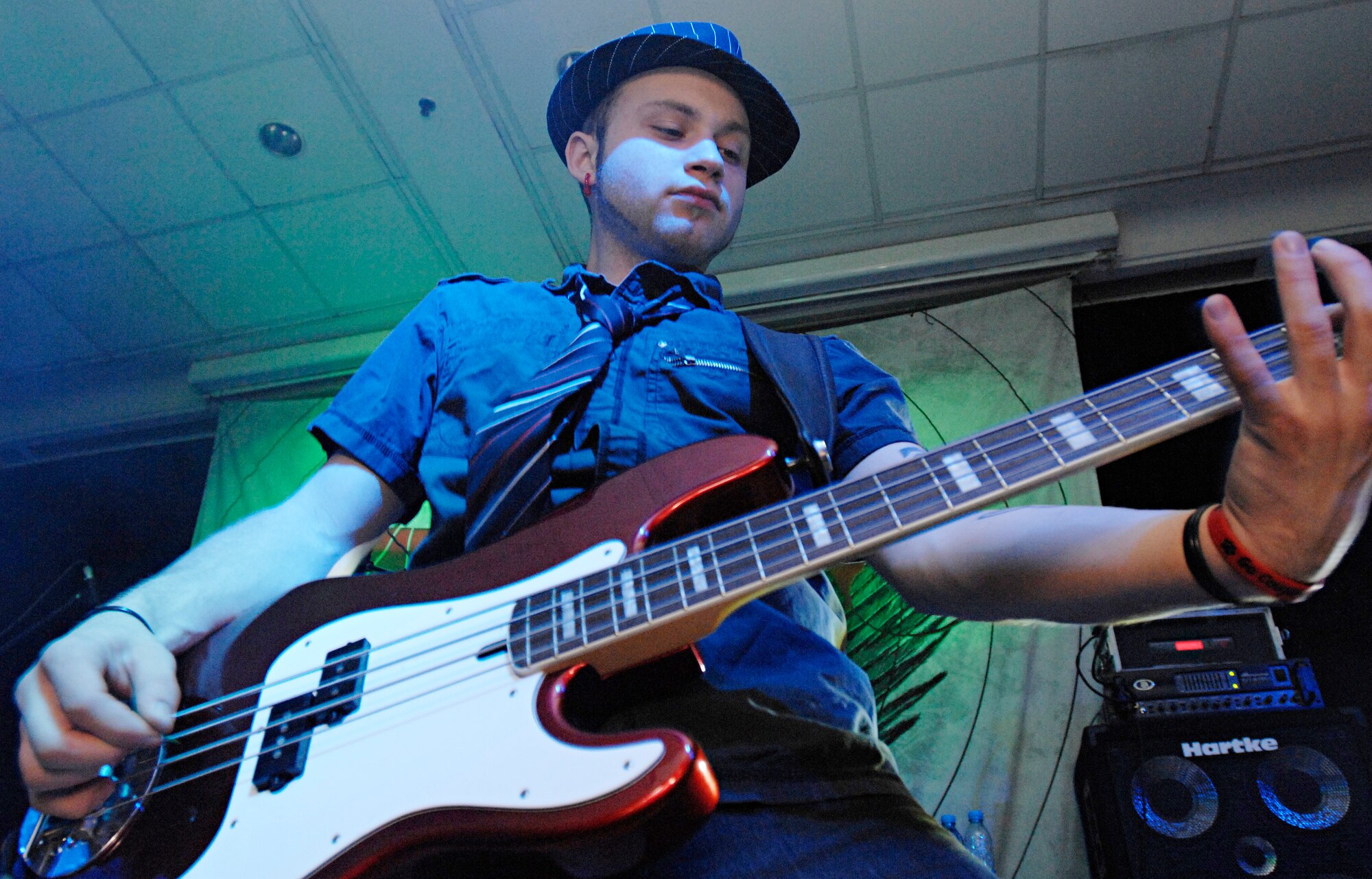 Quietdrive’s bassist, Drew Hastings, picks out a bass line during the 2009 New Year’s Eve Bash hosted by the Incirlik Consolidated Club, Dec. 31. Quietdrive visited Incirlik as part of their Armed Forces Tour. (U.S. Air Force photo/Senior Airman Benjamin Wilson)