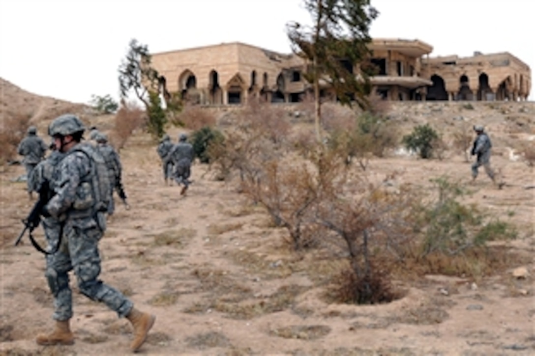 U.S. Army soldiers visit a palace once owned by Saddam Hussein in the Makhul mountains in Bayji, Iraq, Dec. 22, 2008. The soldiers are assigned to 25th Infantry Division's Headquarters Company, 2nd Infantry Battalion, 27th Infantry Regiment, 3rd Brigade Combat Team.  