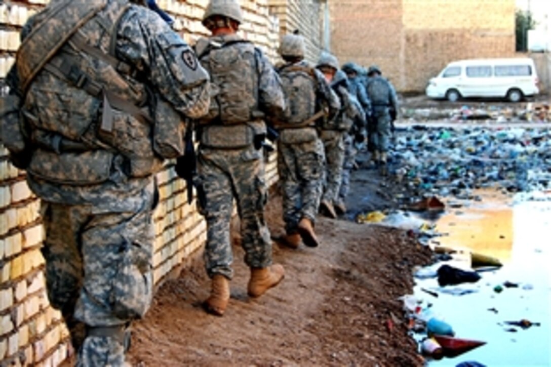 U.S. Army soldiers depart a Hussaniyah neighborhood after searching for illegal weapons caches in northeast Baghdad, Iraq, Dec. 29, 2008. The soldiers are assigned to the 25th Infantry Division's Company A, 1st Battalion, 27th Infantry Regiment, 2nd Stryker Brigade Combat Team. 