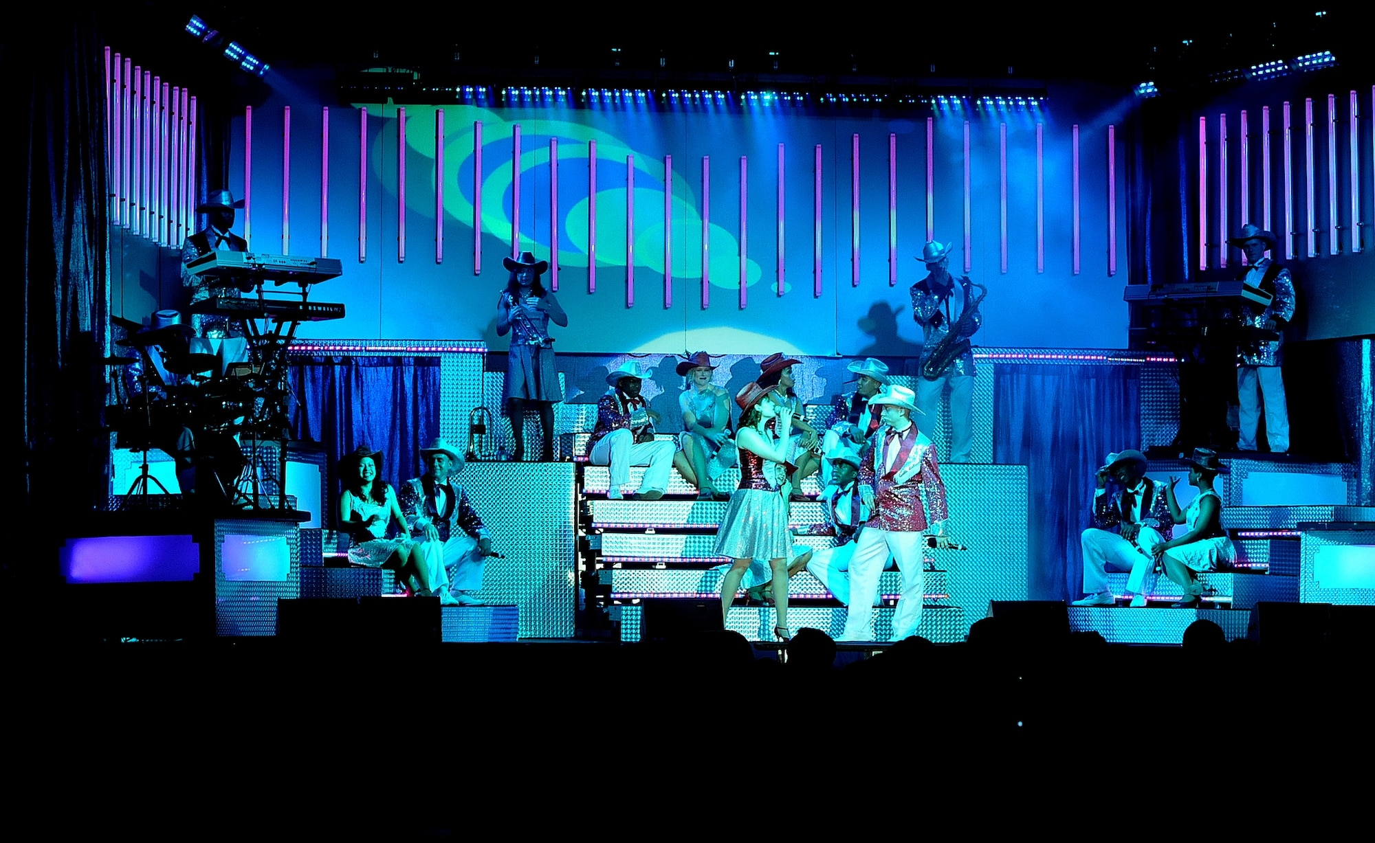 ANDERSEN AIR FORCE BASE, Guam - Tops in Blue performs for Team Andersen Jan 3 in Hangar 1. Tops in Blue serves as an expeditionary entertainment unit to provide quality entertainment from within Air Force resources for the Air Force family. (U.S. Air Force photo by Senior Airman Nichelle Griffiths)