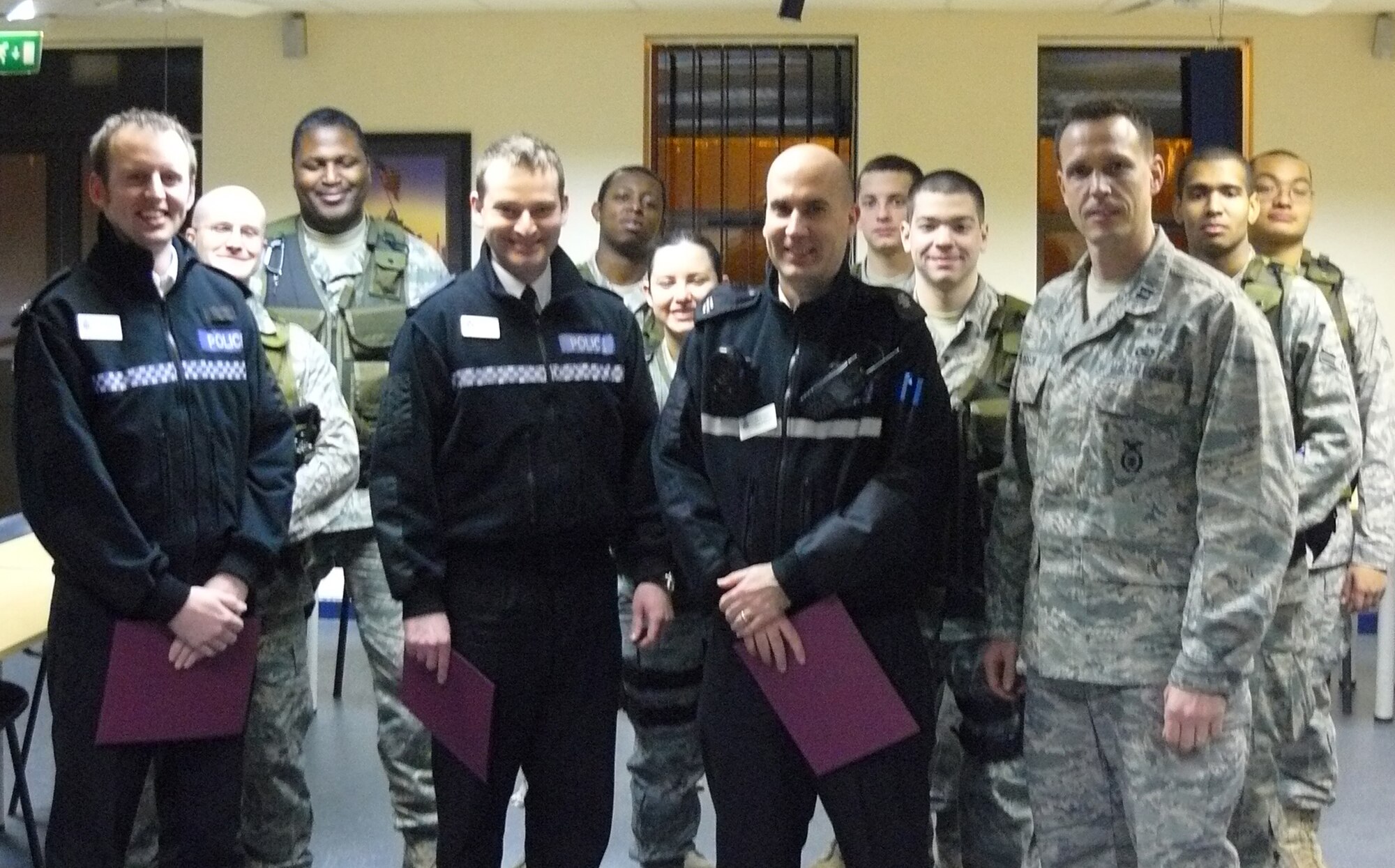 Certificates of Appreciation were presented by RAF Alconbury's 423d Security Forces to members of the Cambridgeshire Police Dept and Ministry of Defense Police for their security role during the Madingley Veterans Day ceromony in November. The event was enjoyed by over 150 military/civilians and retirees

MSgt Connolly, the Operation Superintendant says its great to work with the local law enforcement agencies, they have a lot of experience, and are just a bunch of good guys to work with.

The 423d continues to foster host nation realationships with their law enforcement peers, and has already begun the liason for projects in the New Year.
