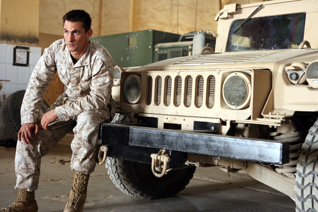 CAMP AL QAIM, Iraq - Cpl. Joshua W. Dale, a 23-year-old section leader with A Company, 1st Battalion, 7th Marine Regiment brought his ideas to life by inventing a breaching bumper for a humvee in his mobile assault platoon. The breaching bumper is mounted on the front of the humvee and resembles a large arrowhead made of thick steel. The bumper is used to do one thing  tear through anything that gets in the humvee's way. The bumper, which allows humvees greater flexibility when assaulting the enemy during raids and cordon-and-knock operations, is an alternative to using explosives to destroy barriers and walls. Dale is from Silver Street, S.C.