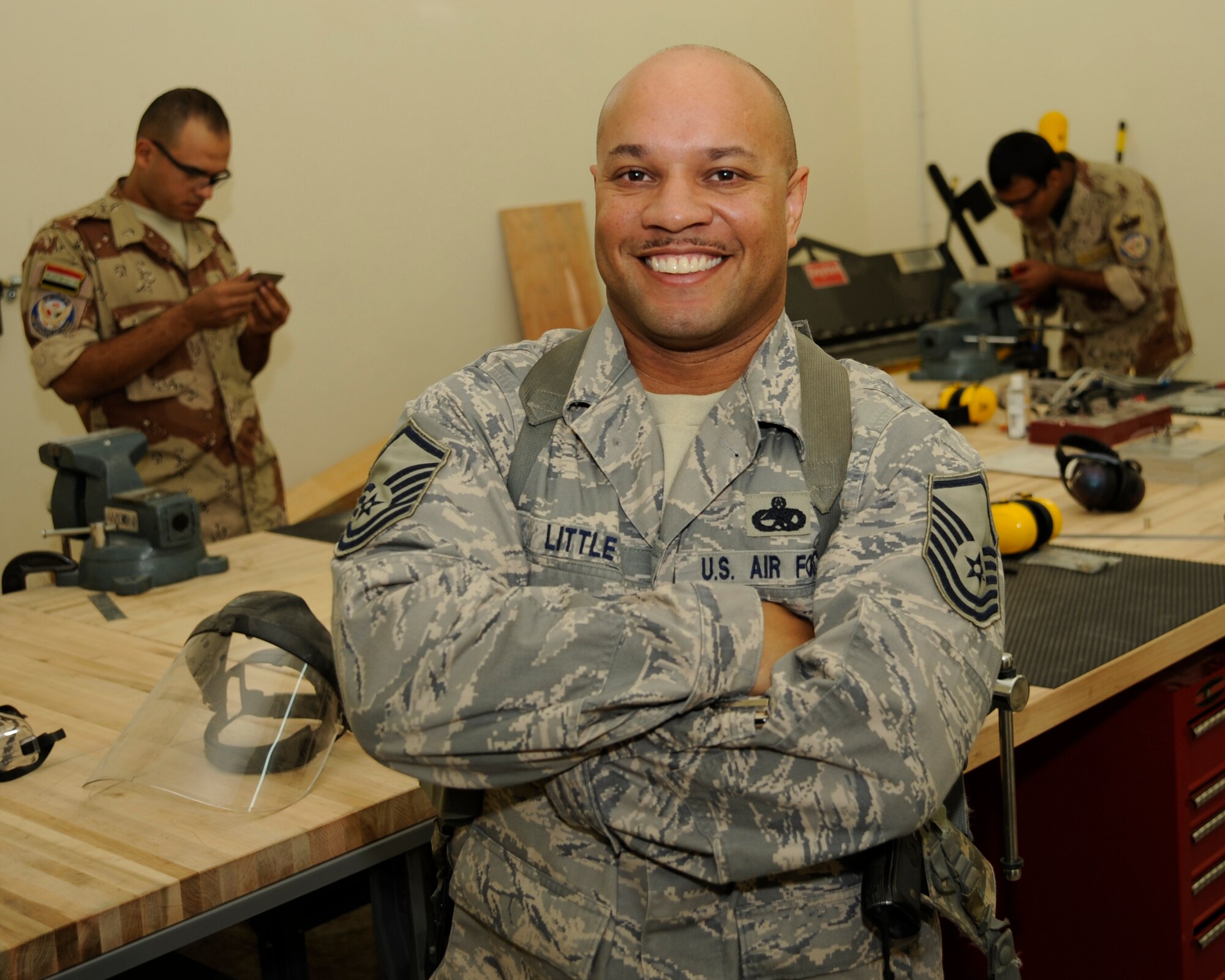 TAJI, Iraq -- Master Sgt. Joel Little, aircraft structural maintenance instructor with 821st Air Expeditionary Training Squadron, poses for a photo at Al-Taji Air Base, Iraq. Little, a Charlotte, N.C. native, is deployed from the 361st Training Squadron, Detachment 2, Naval Air Station Pensacola, Fla. (U.S. Air Force photo/Staff Sgt. Paul Villanueva II)
