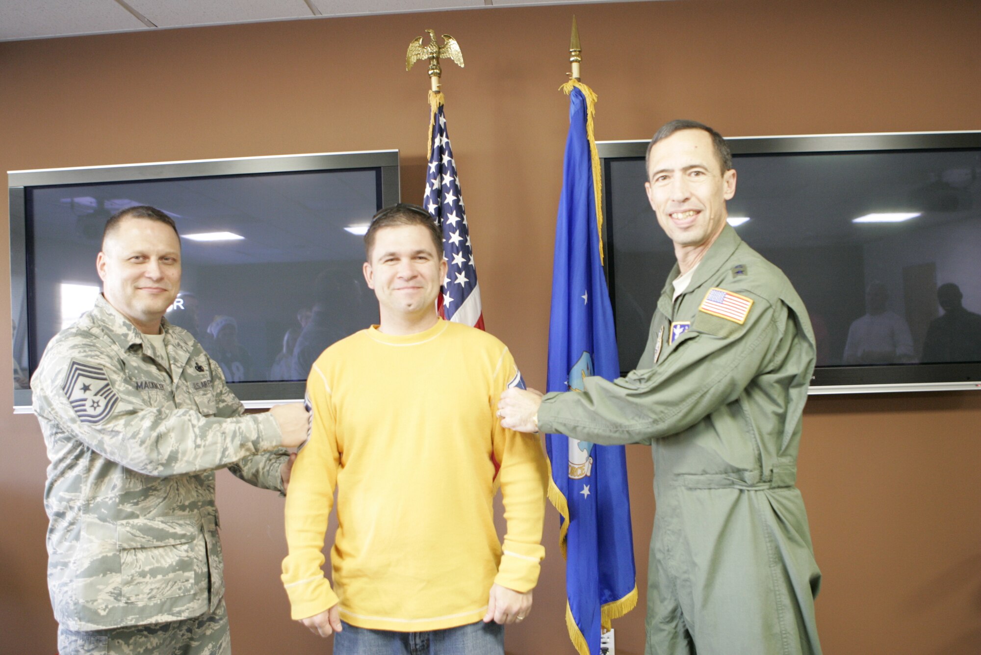 VANDENBERG AIR FORCE BASE, Calif. --  Michael Worden, the 30th Launch Group training manager, is promoted to master sergeant by Lt. Gen. Larry James, the 14th Air Force commander, and Chief Master Sgt. James MacKinley, the 14th AF command chief. (Courtesy photo)