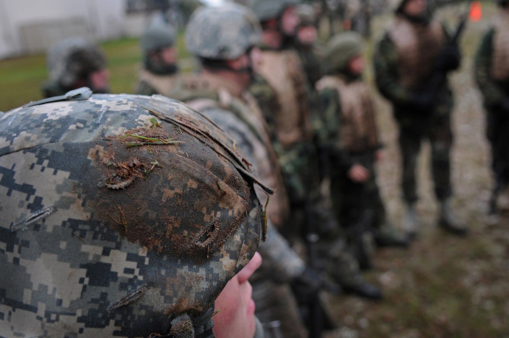 Air Force members receive instructions for their next exercise Dec. 18, 2008, in Einseidlerhof, Germany. Airmen participated in a two-day Combat Skills Training course in preparation for deployment.(U.S. Air Force photo by Airman 1st Class Grovert Fuentes-Contreras)