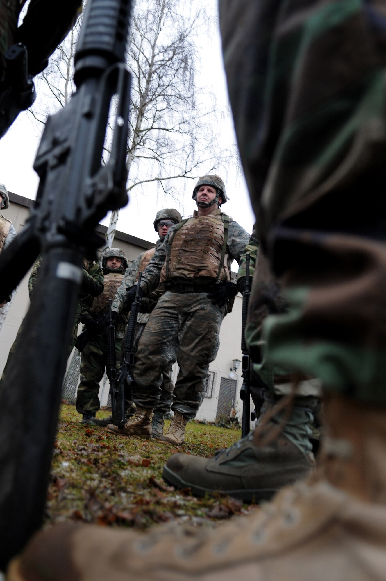 Air Force members receive instructions for their next exercise Dec. 18, 2008, in Einseidlerhof, Germany. Airmen participated in a two-day Combat Skills Training course in preparation for deployment.(U.S. Air Force photo by Airman 1st Class Grovert Fuentes-Contreras)