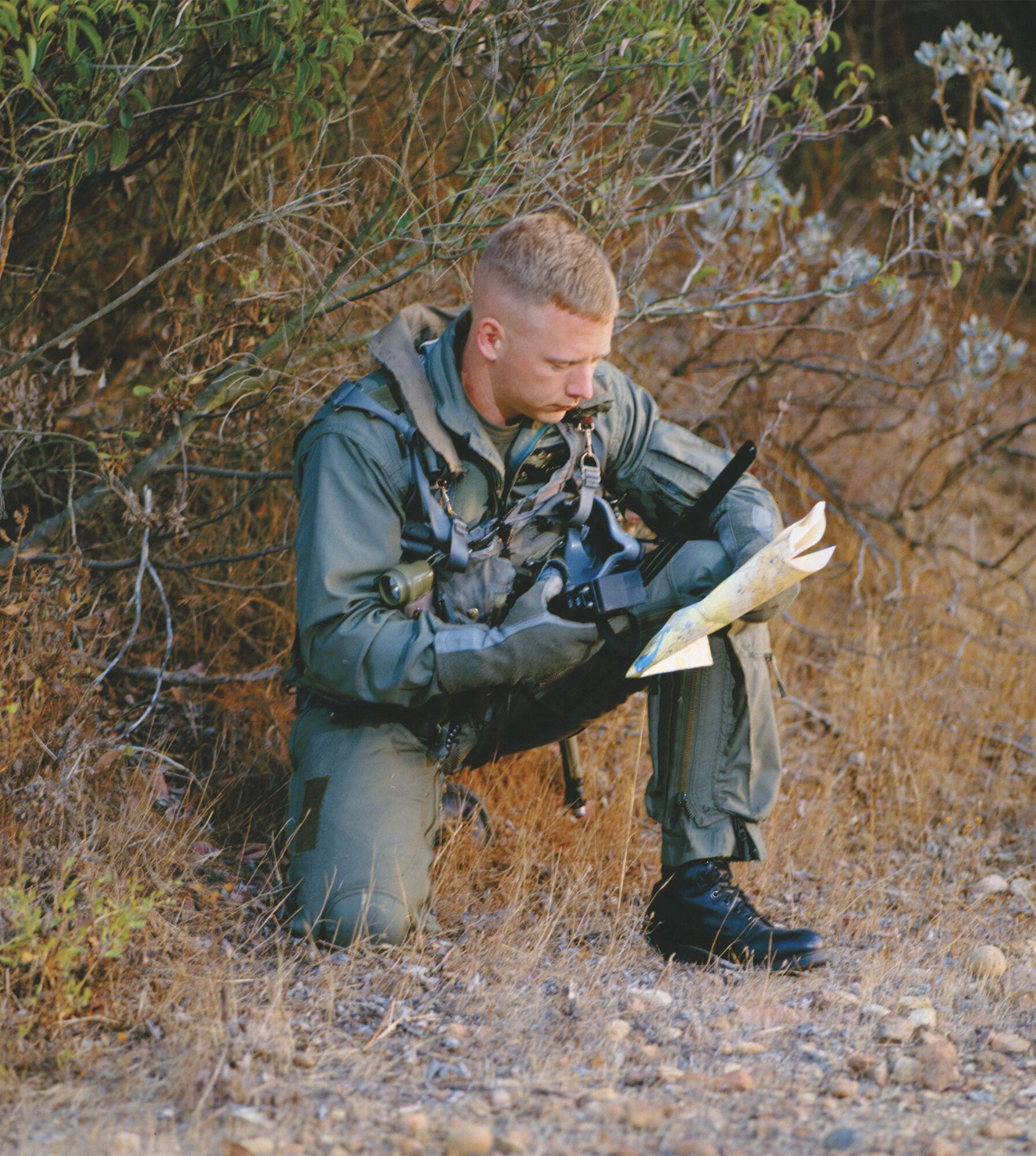 An individual tests an early iteration of the Combat Survivor Evader Locator Radio near the Southern California facilities of the system’s prime contractor, Boeing Corp.  Boeing and the Air Force Electronic Systems Center delivered the 20,000th CSEL radio to operators this fall and are on track to deliver 20,000 more.