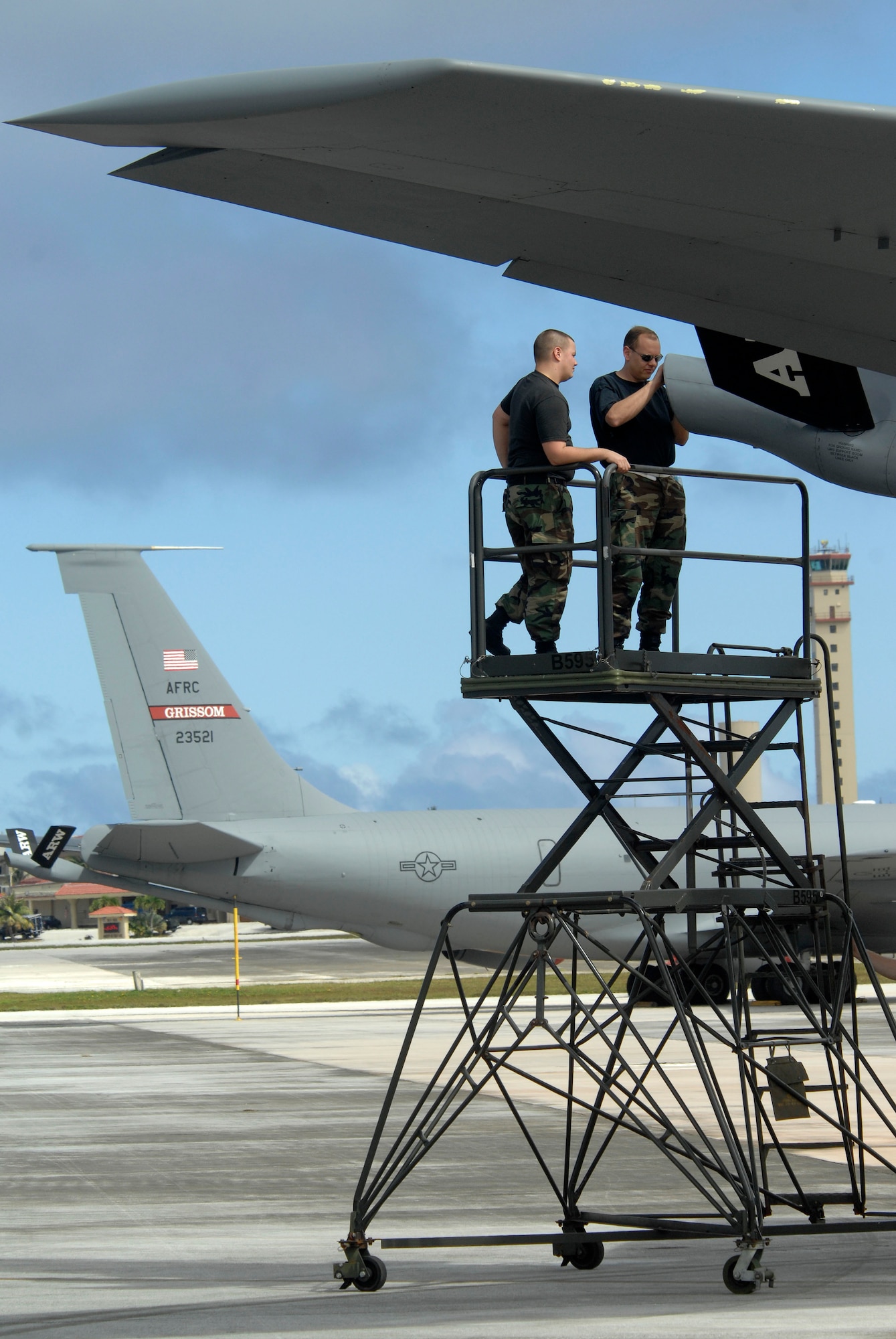 (left) Senior Airman David Engelhardt, crew chief and Master Sgt. Brian Dickerson an electrician, change a KC-135R Stratotanker boom marker light Dec. 31 at Andersen Air Force Base, Guam. Both are assigned to the 434th Air Refueling Wing at Grissom Air Reserve Base, Ind., and are deployed to Andersen AFB in support of Pacific theater refueling operations.  
 
(U.S. Air Force photo/ Master Sgt. Kevin J. Gruenwald) released




















  












 











































  












 

























