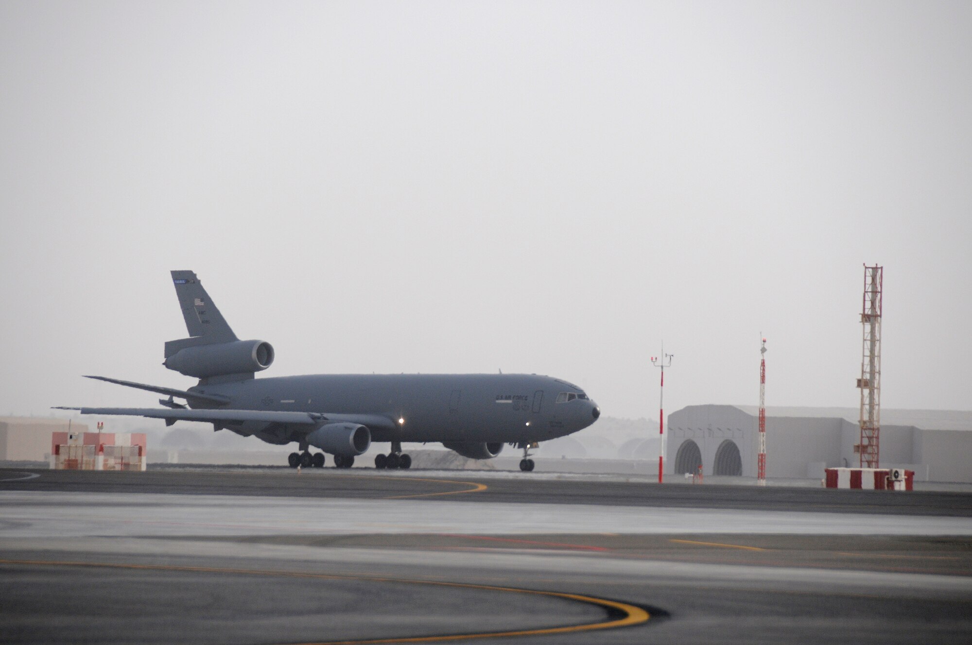 SOUTHWEST ASIA -- A KC-10 Extender carrying Master Sgt. Clifford Hughes from the 908th Expeditionary Air Refueling Squadron takes off here Jan. 3. The crew is going into the area of responsibility to deliver fuel to various aircraft in support of operations Iraqi and enduring freedom. Sergeant Hughes has flown over 300 combat missions, in 7 years of deploying. He has deployed nearly 800 days. Six of the deployments were with the MH-53M Pavelow and three on the KC-10 A Extender. Sergeant Hughes is deployed from the 2nd ARS McGuire Air Force Base, N.J., his hometown is Eatonville, Wash. (U.S. Air Force photo/Tech. Sgt. Christopher A. Campbell) (released)