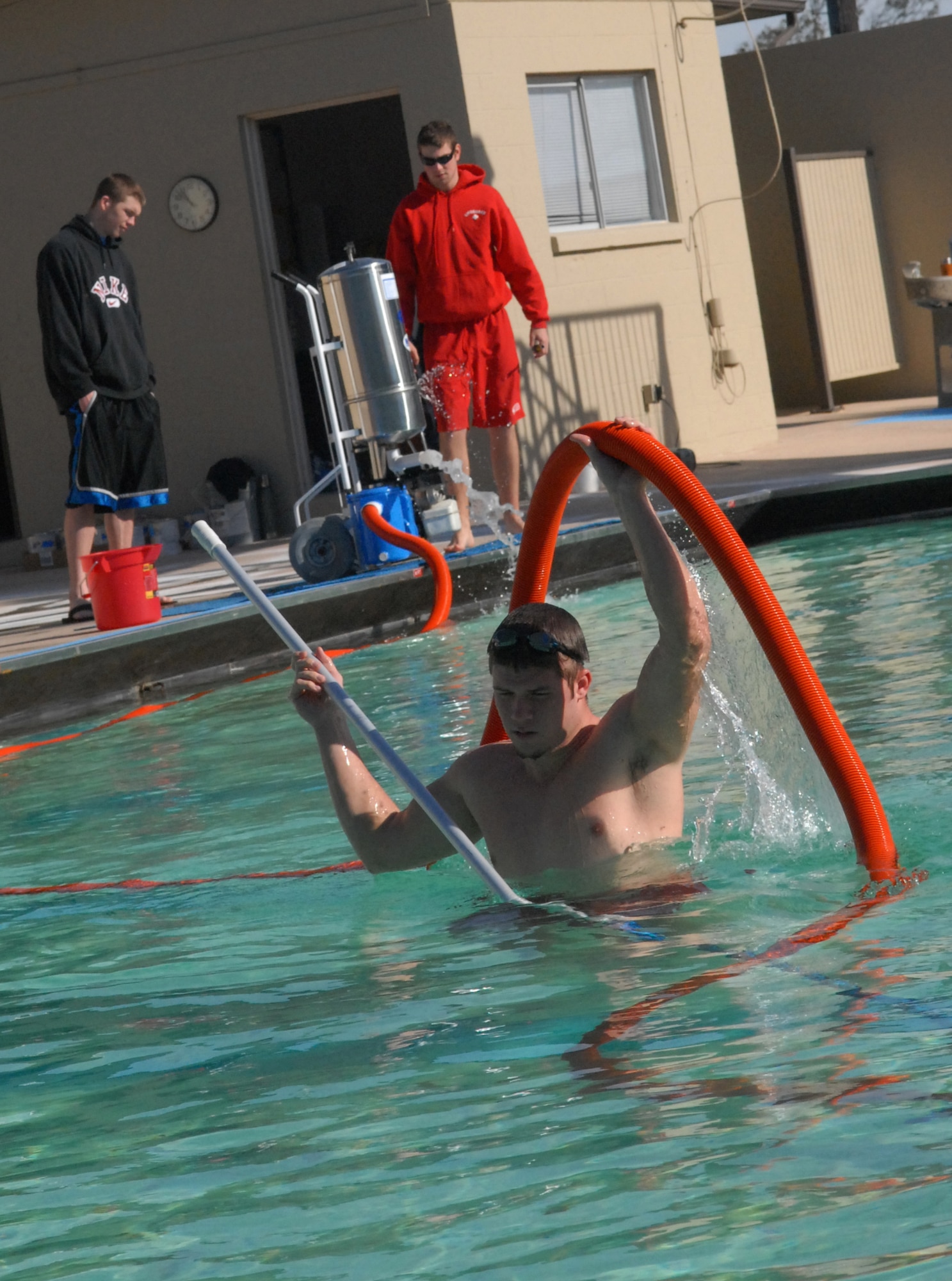VANDENBERG AIR FORCE BASE, Calif. -- Life guards at the base pool vaccum the debri at the bottom of the pool Jan. 6. The base pool is projected to be open by mid-January. (U.S. Air Force photo/Airman 1st Class Antoinette Lyons)
