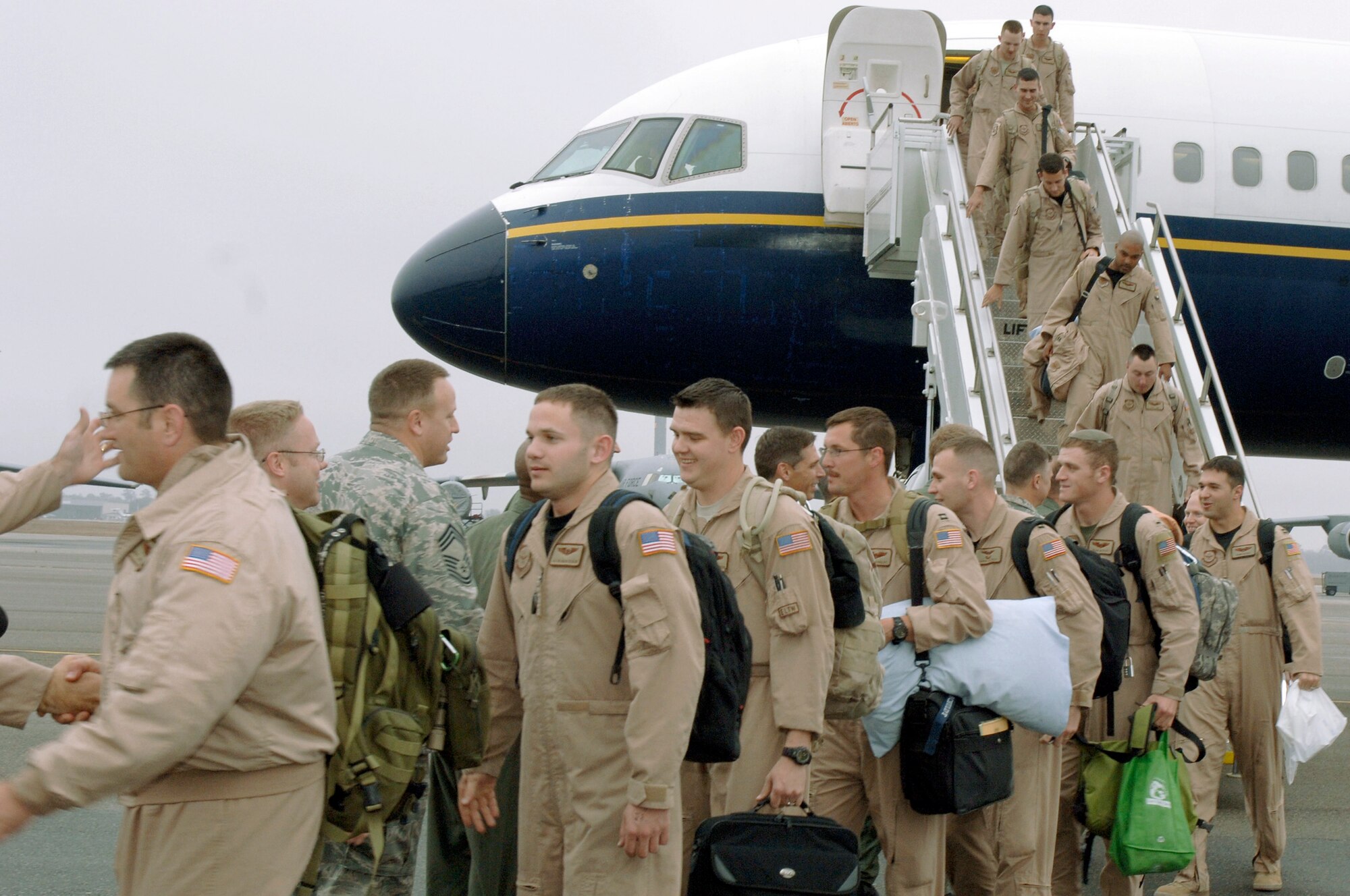 Airmen of the 15th Airlift Squadron return from their deployment Jan. 3 at Charleston Air Force Base, S.C. More than a 130 Airmen from the 15th Airlift Squadron returned from their 120-day deployment in Southwest Asia. (U.S. Air Force photo/Staff Sgt. Marie Cassetty)

