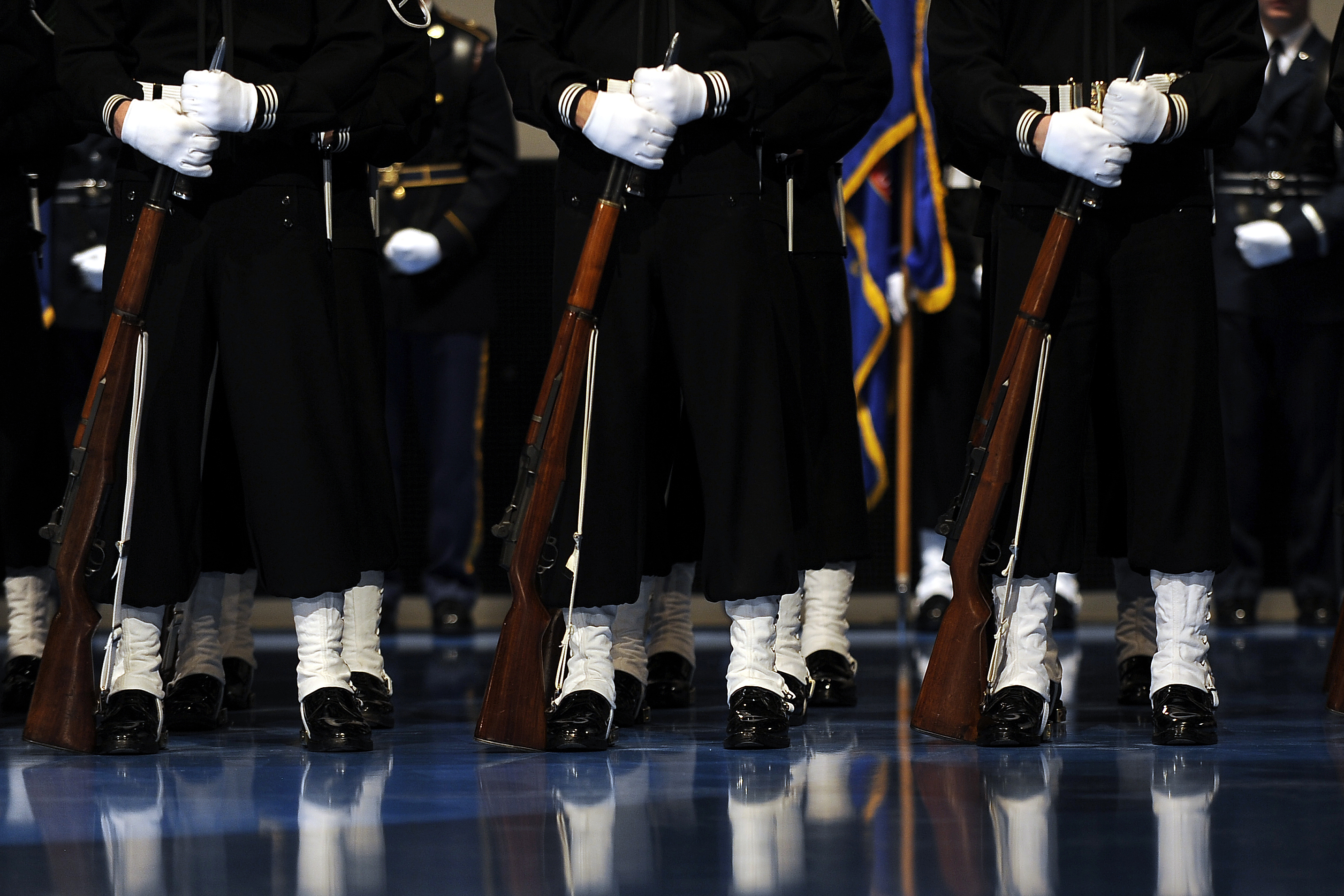 The U.S. Navy Ceremonial Guard stands at parade rest during the
