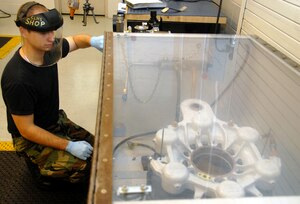 Senior Airman Robert Kayser performs a brake test Jan. 7 at the 437th Maintenance Squadron hydraulic shop here.  By making modifications to the machine, the hydraulic shop saved more than $11,800 in initial fluid cost and disposal fees in 2008.  Airman Kayser is a journeyman with the 437 MXS. (U.S. Air Force photo/Airman Ian Hoachlander)