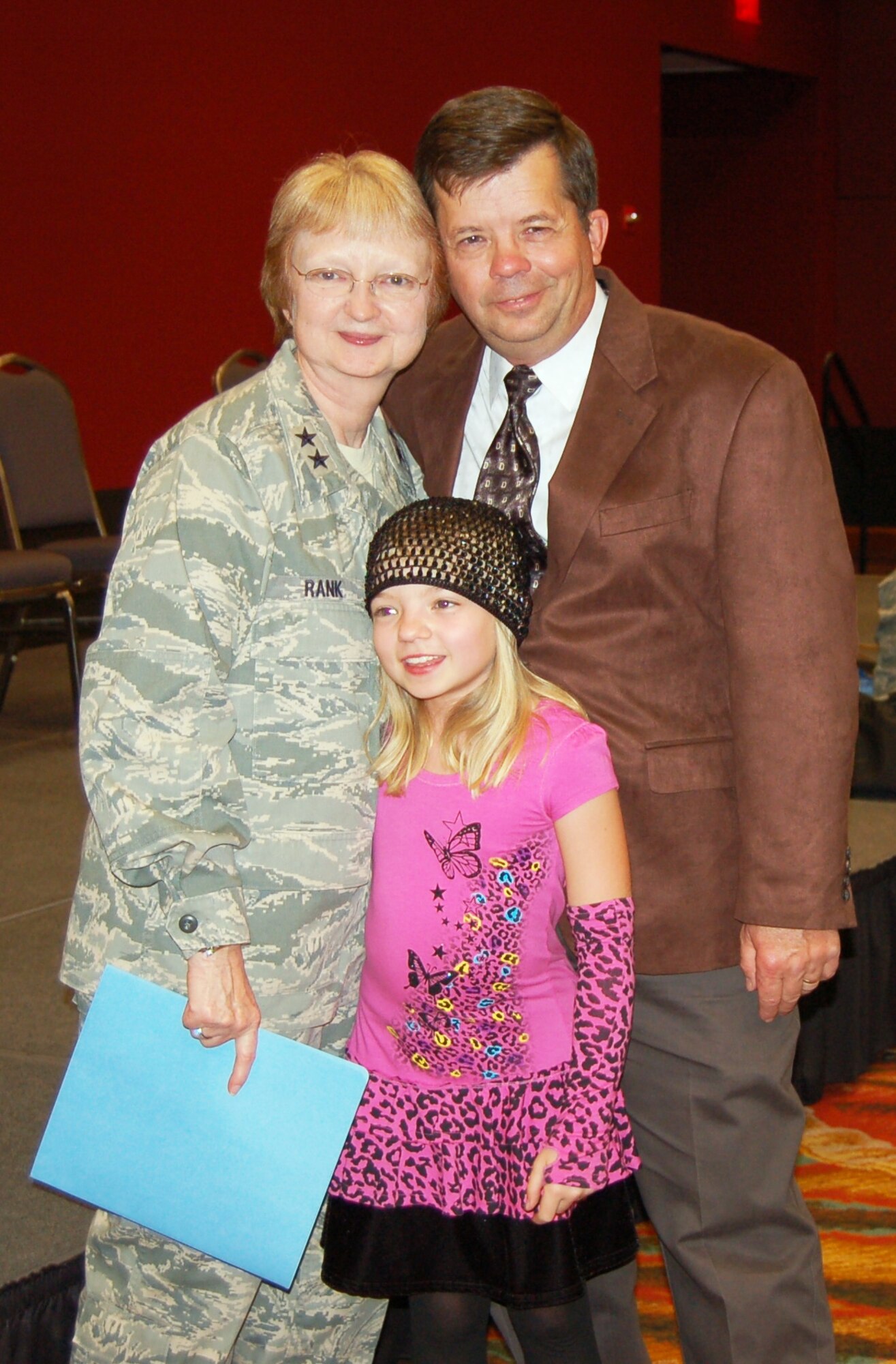 Maj. Gen. Melissa A. Rank pictured with her husband, Gary and daughter, Katelin after her Nov. 13, 2008, retirement ceremony at the Henry B. Gonzalez Center during the Association of Military Surgeons of the U.S. Convention in San Antonio. 
(U.S. Air Force photo by Maj. David C. Zimmerman)
