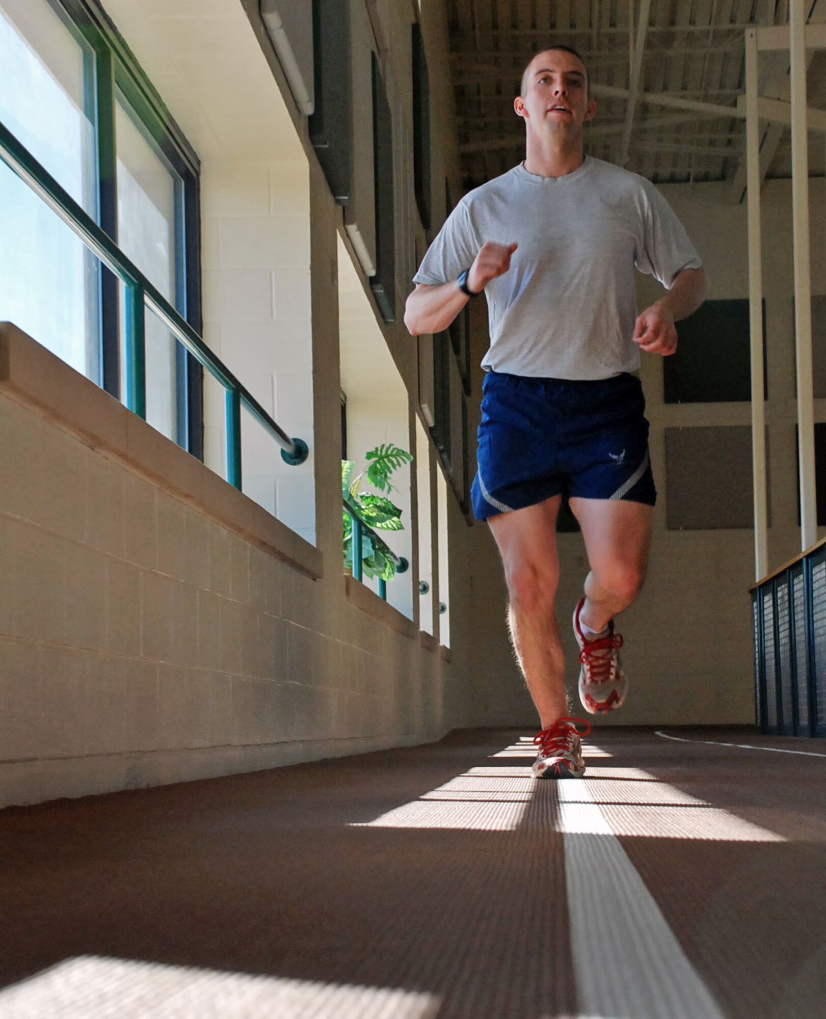 LAUGHLIN AIR FORCE BASE, Texas – 2nd Lt. Joel Borgan, 47th Operations Support Squadron, runs on the track inside the Losano Fitness Center Jan.6. Lieutenant Borgan is running to keep true to his New Year’s resolution of staying in shape for 2009. (U.S. Air Force photo by Airman 1st Class Sara Csurilla)