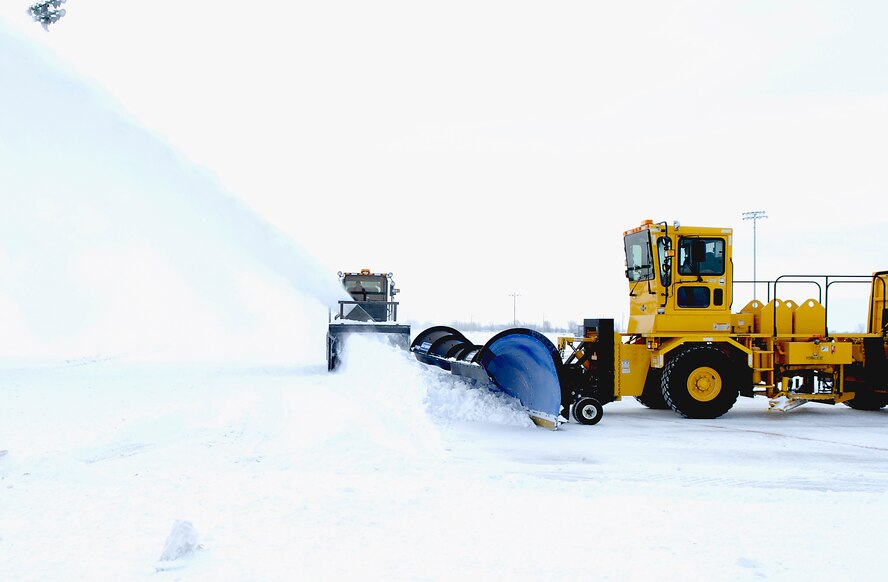 MINOT AIR FORCE BASE, N.D. -- The 5th Civil Engineer Squadron is charged with keeping the airfield clear of snow to fulfill mission requirements here. The airfield is just one of many areas cleaned by this unit. (U.S. Air Force photo by Airman 1st Class Benjamin Stratton)