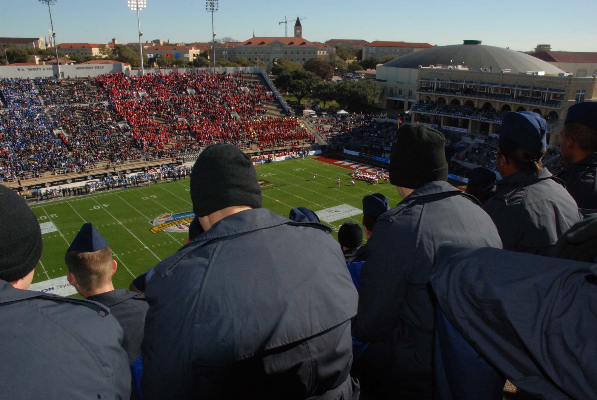 About 700 Sheppard Airmen cheer on the Air Force Academy Falcons during their game against the Houston Cougars at the 2008 Armed Forces Bowl in Fort Worth, Texas. (U.S. Air Force photo/Airman 1st Class Candy Miller)
