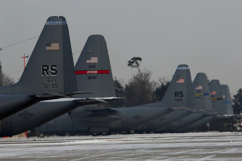C-17 Globemaster III's begin to unthaw at Ramstein Air Base Jan. 6, 2009, after a long night of snow fall. (U.S. Air Force photo by Airman 1st Class Kenny Holston)