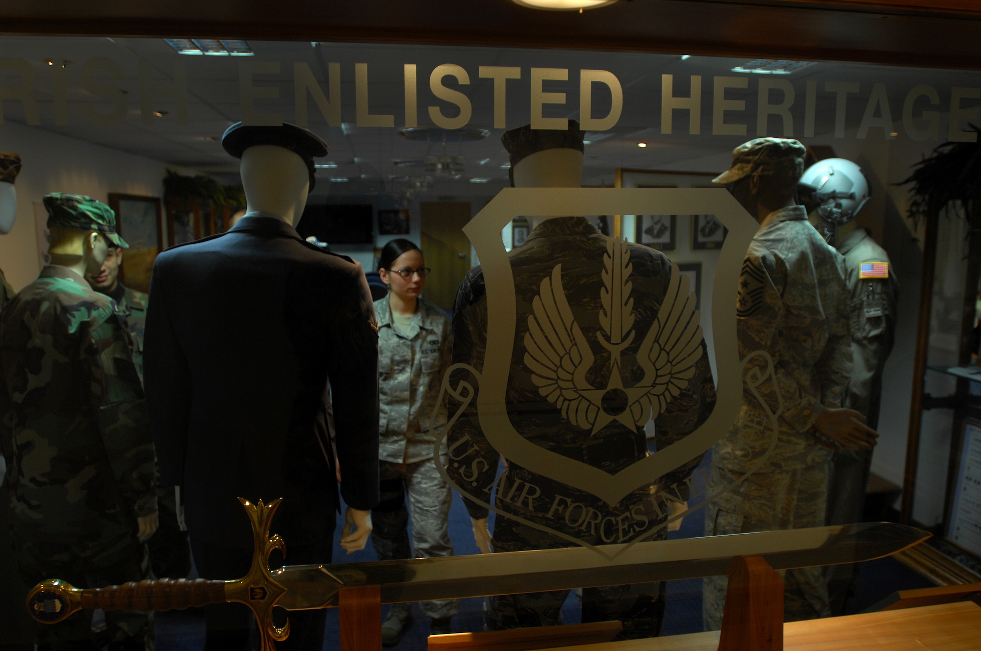 Air Force members take a tour of the Ramstein Air Base Enlisted Heritage Hall Jan. 6, 2009. The hall displays an array of different Air Force enlisted artifacts. (U.S. Air Force photo by Airman 1st Class Kenny Holston)